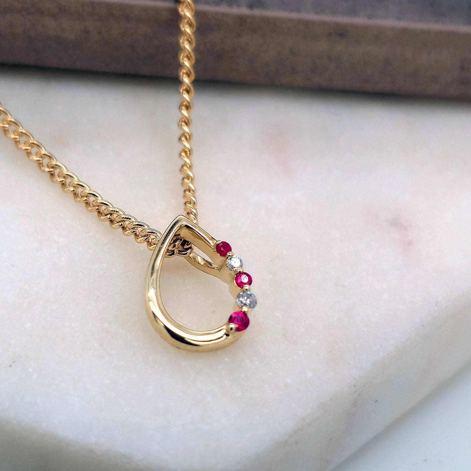 9ct ruby & diamond pendant