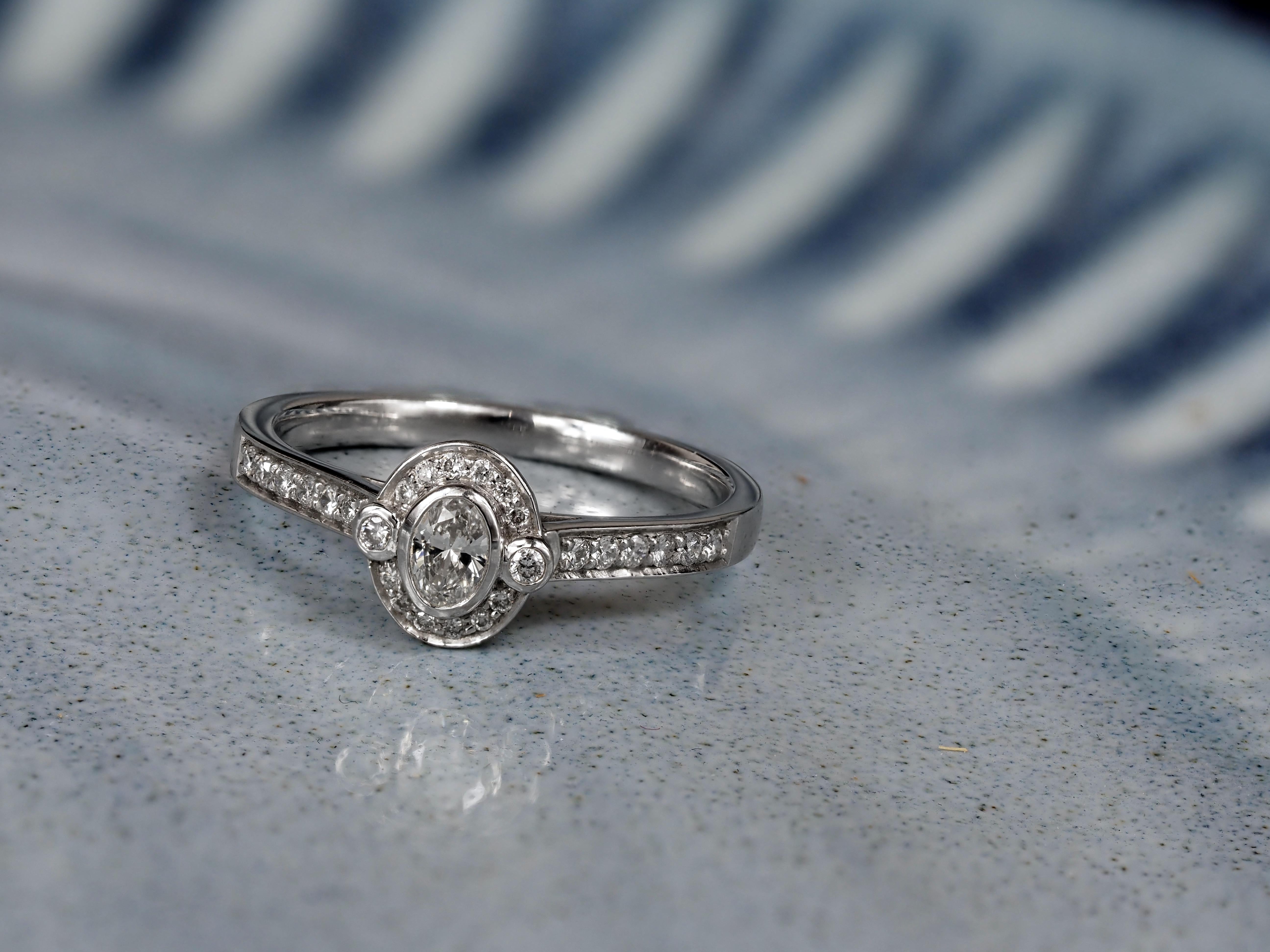 18ct White Gold Oval Cut Diamond Halo Engagement Ring, 0.15ct Centre