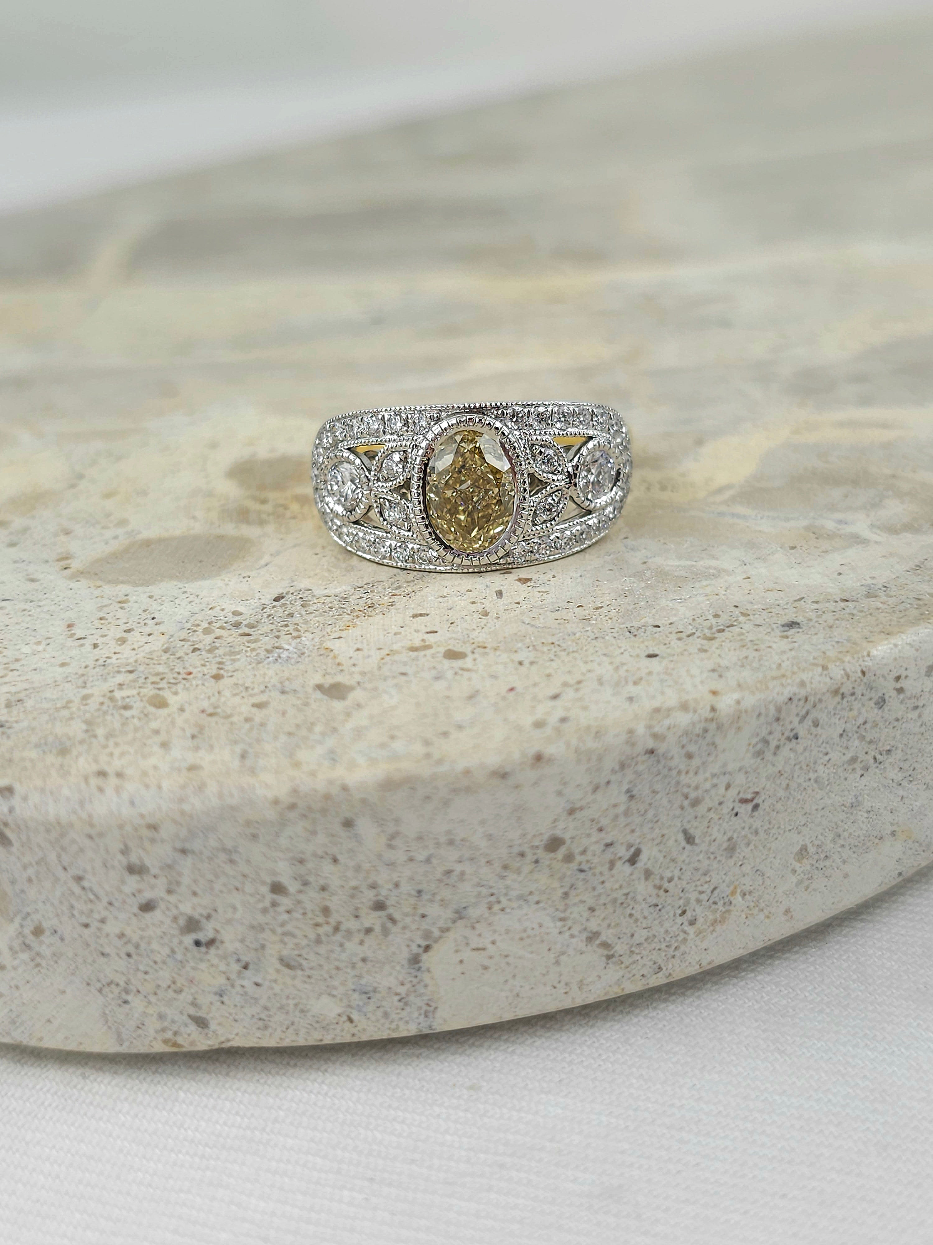 18ct Gold Natural Yellow Oval Diamond Ring, 1.15 carat centre.
