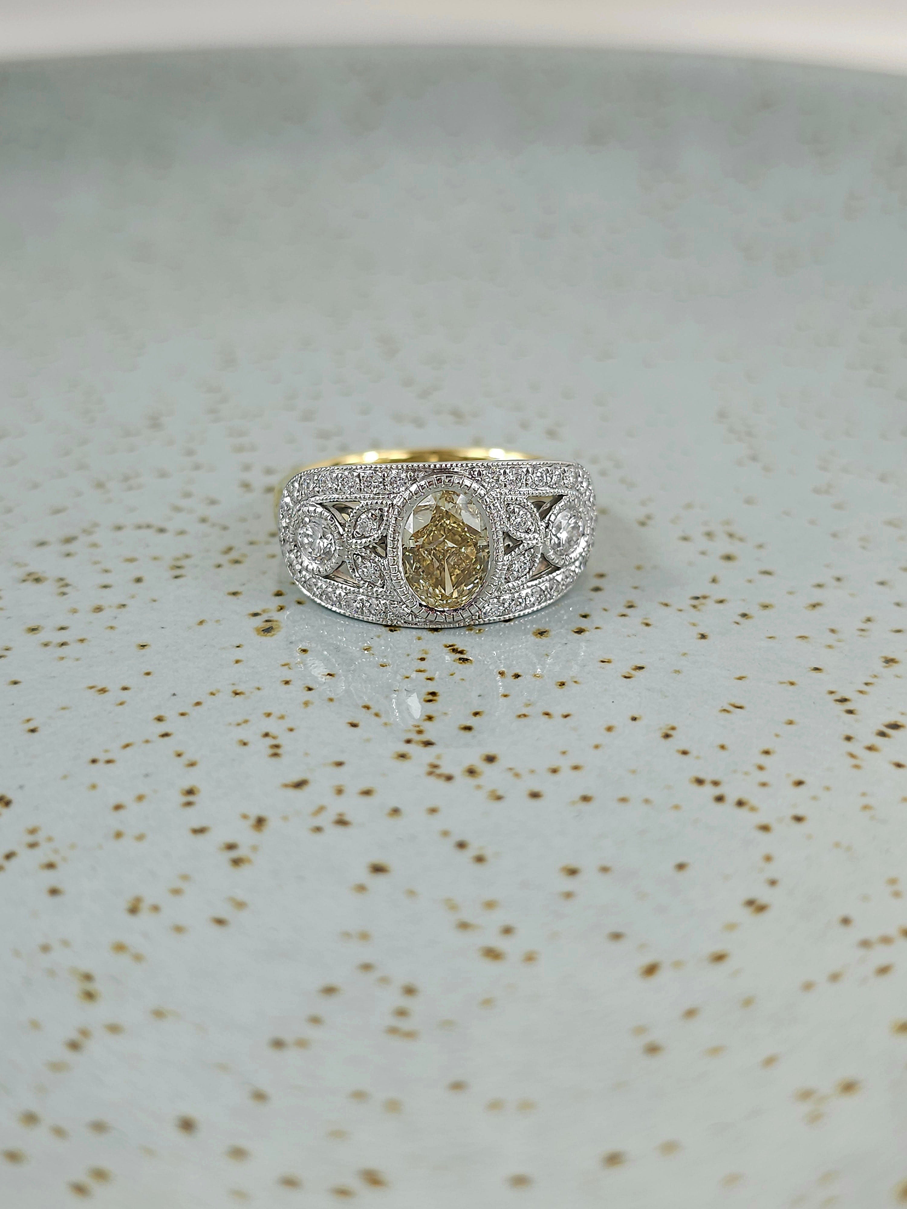 18ct Gold Natural Yellow Oval Diamond Ring, 1.15 carat centre.