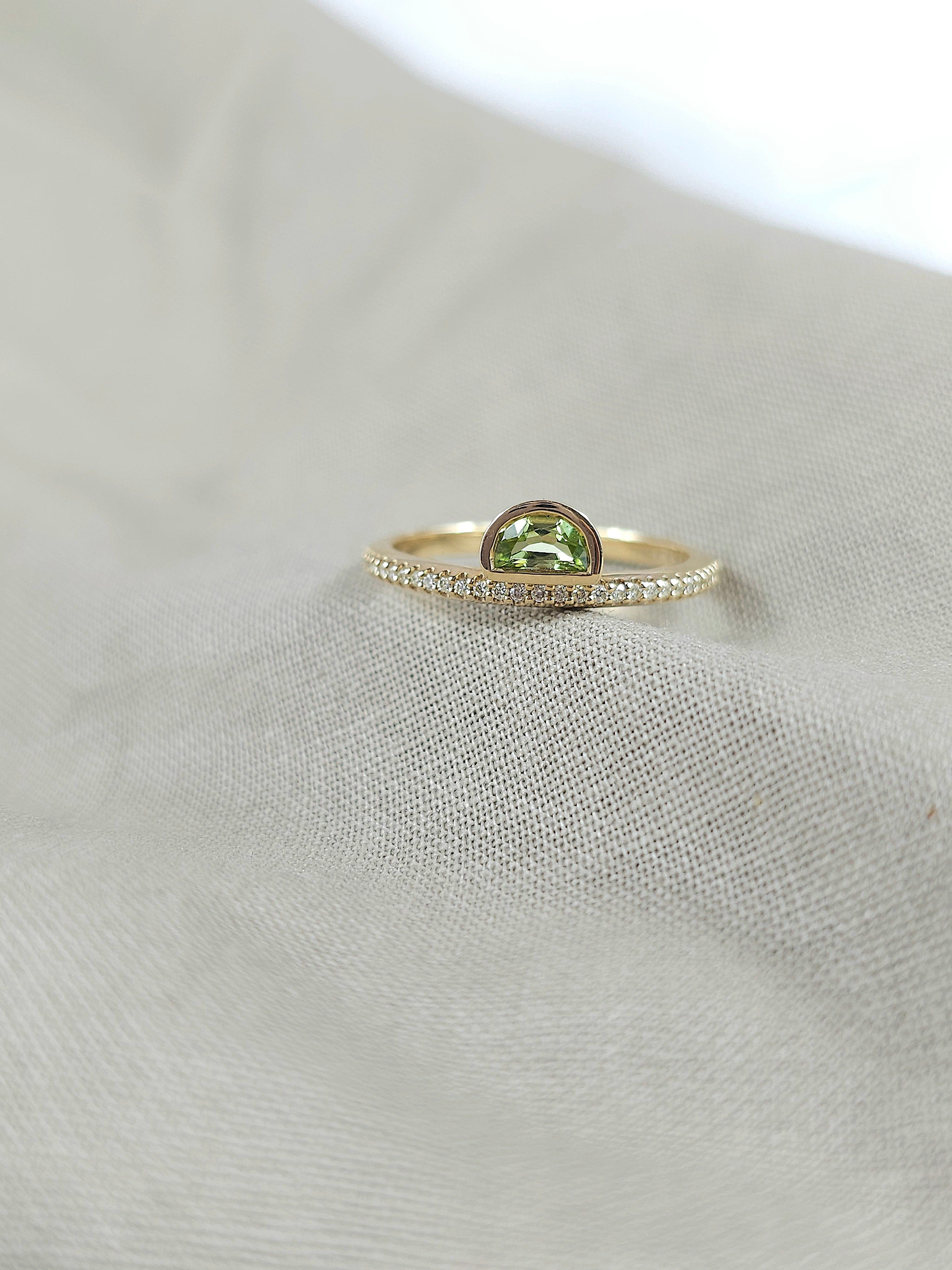 9ct Yellow Gold Peridot and Diamond Ring, 0.27ct centre