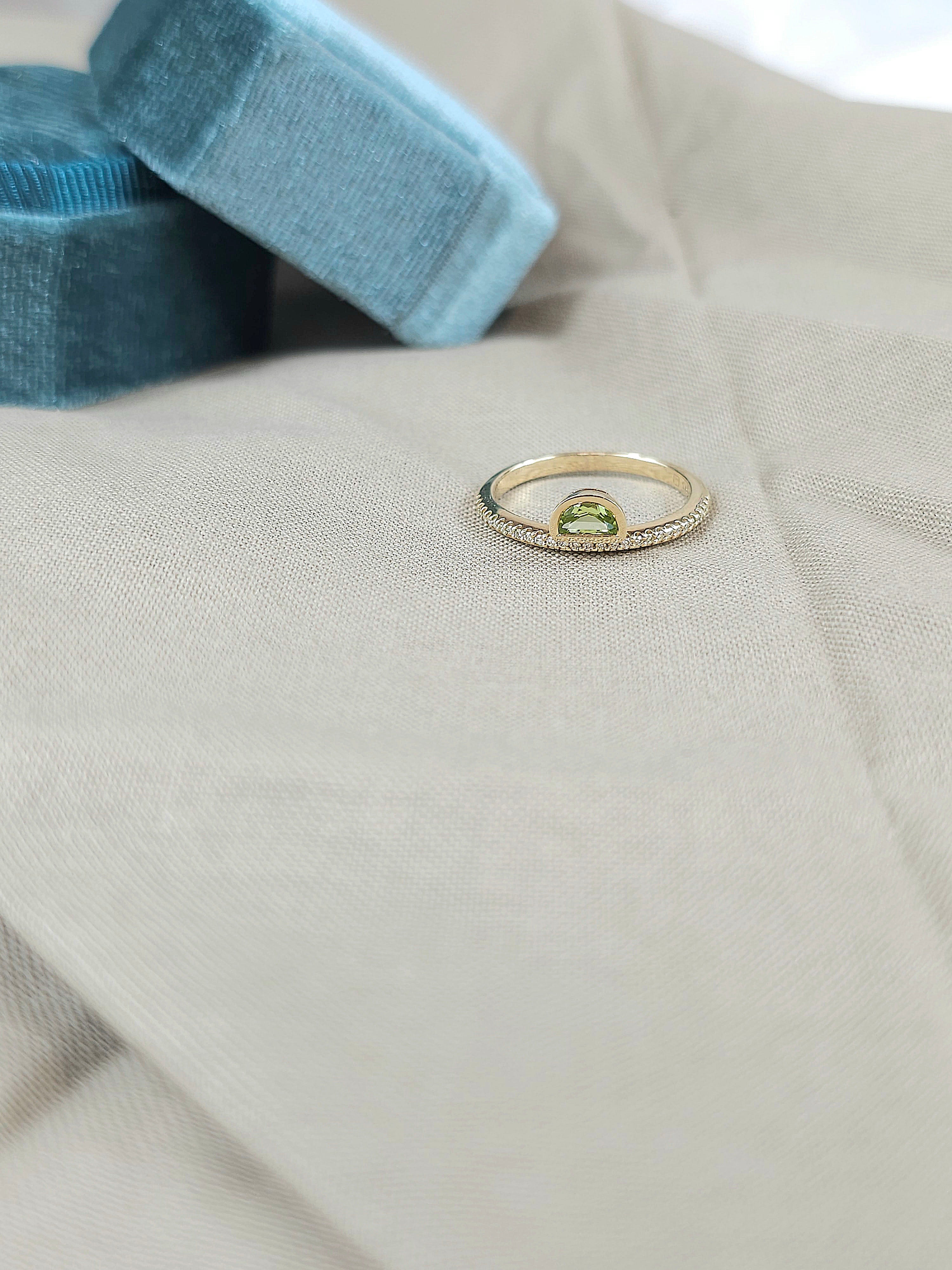 9ct Yellow Gold Peridot and Diamond Ring, 0.27ct centre