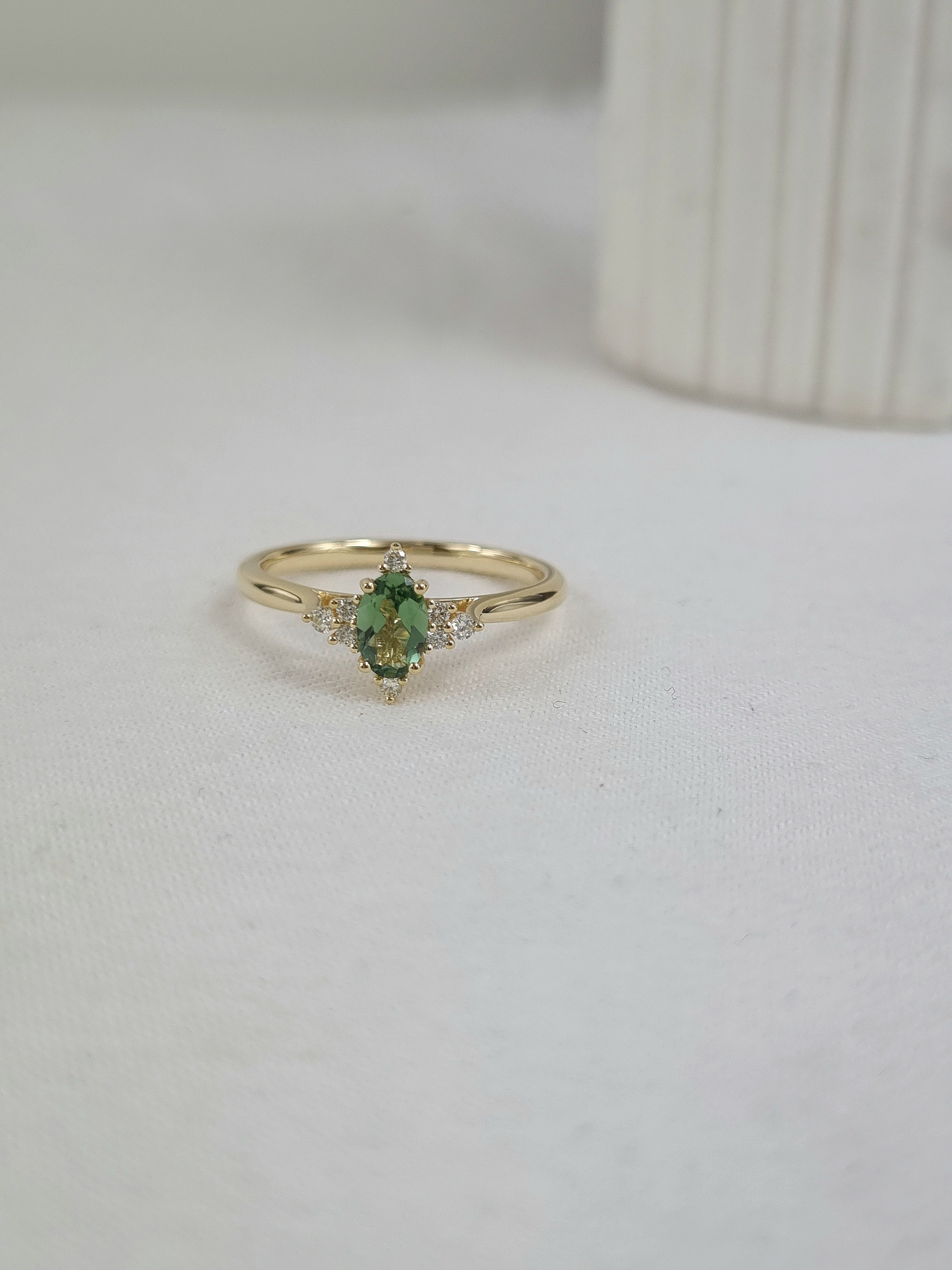 9ct Yellow Gold Mint Tourmaline and Diamond ring, 0.38ct centre