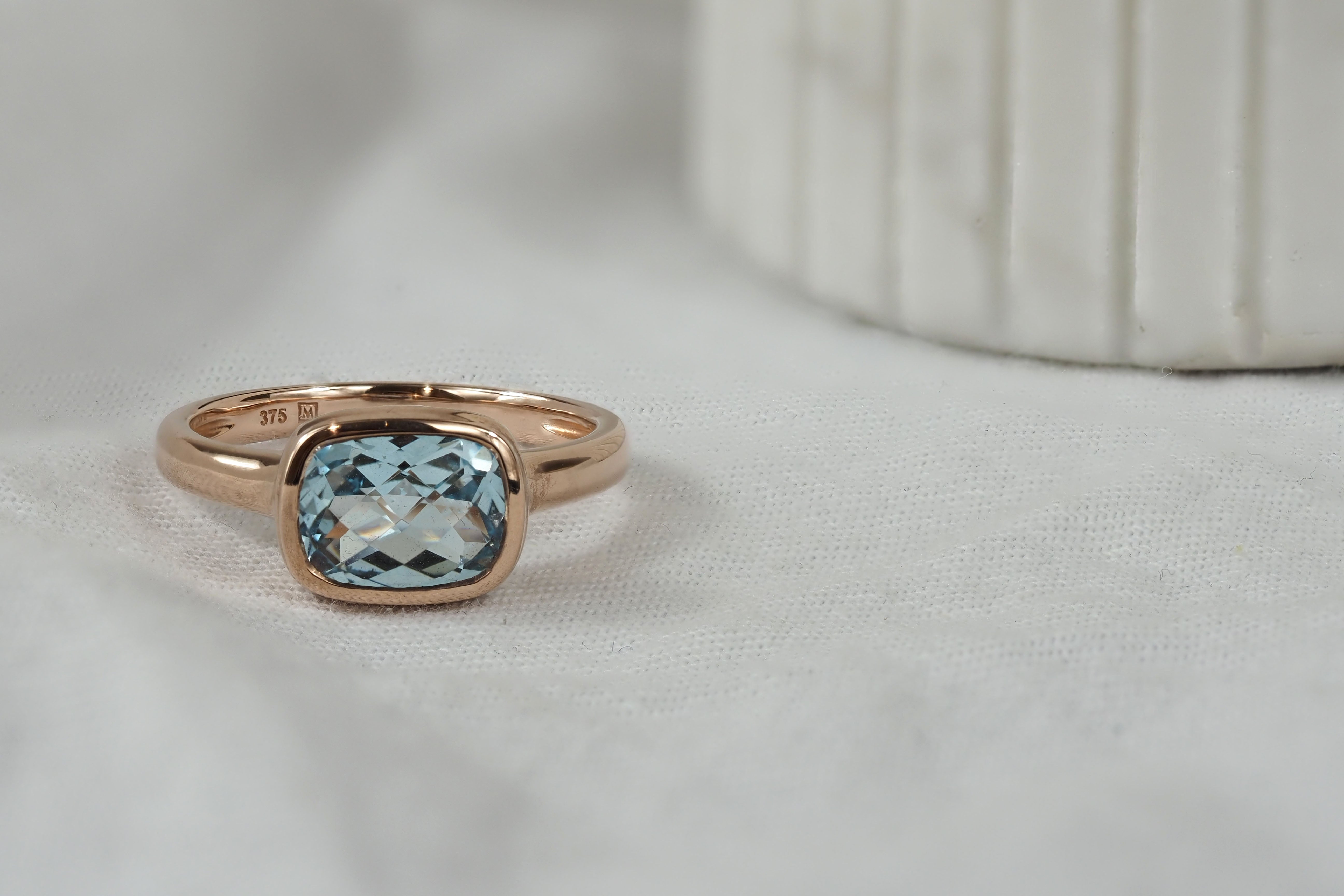 9ct Rose Gold & Blue Topaz ring