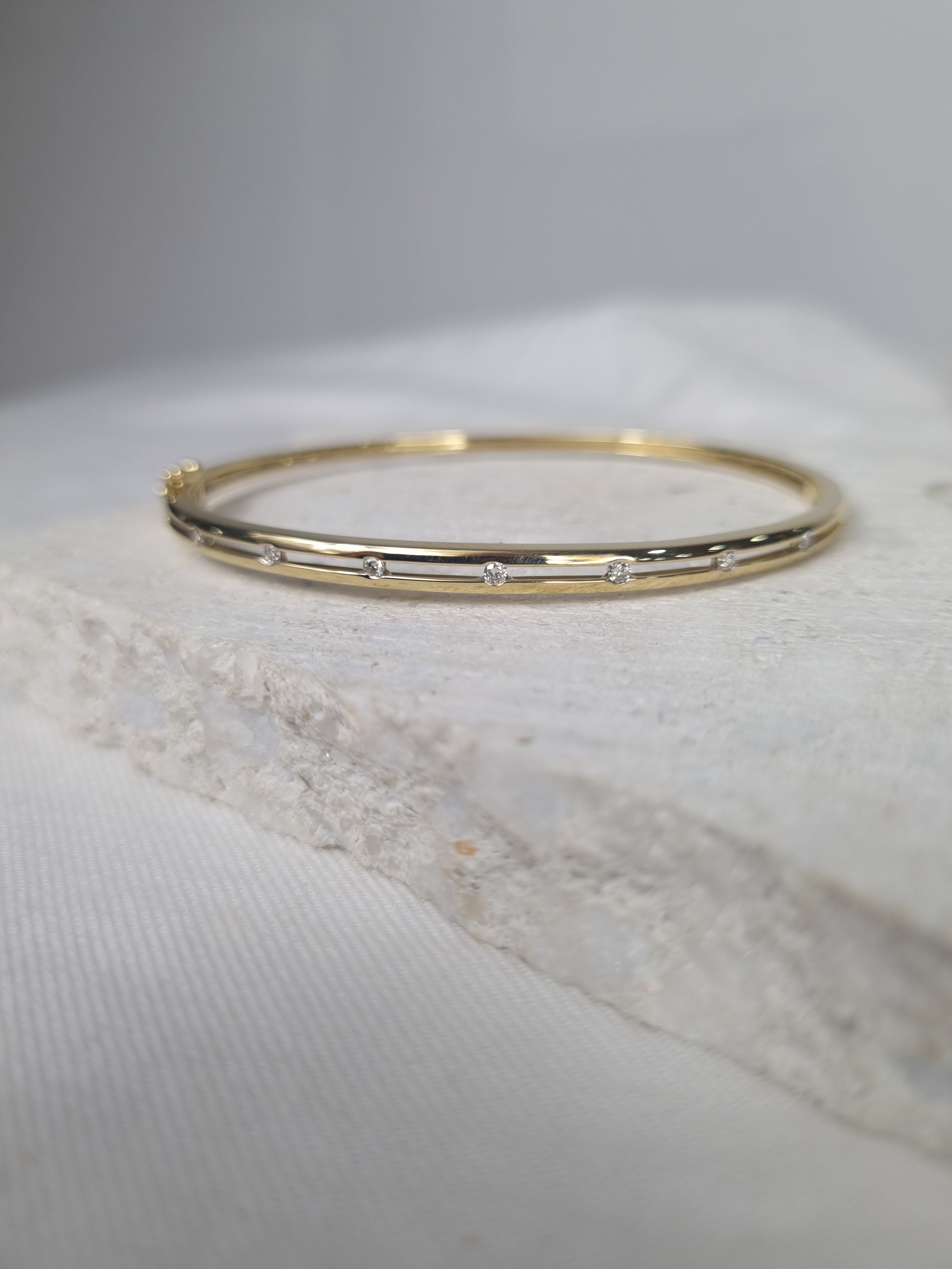 9ct Yellow and White Gold Diamond Bangle, 0.146ct total