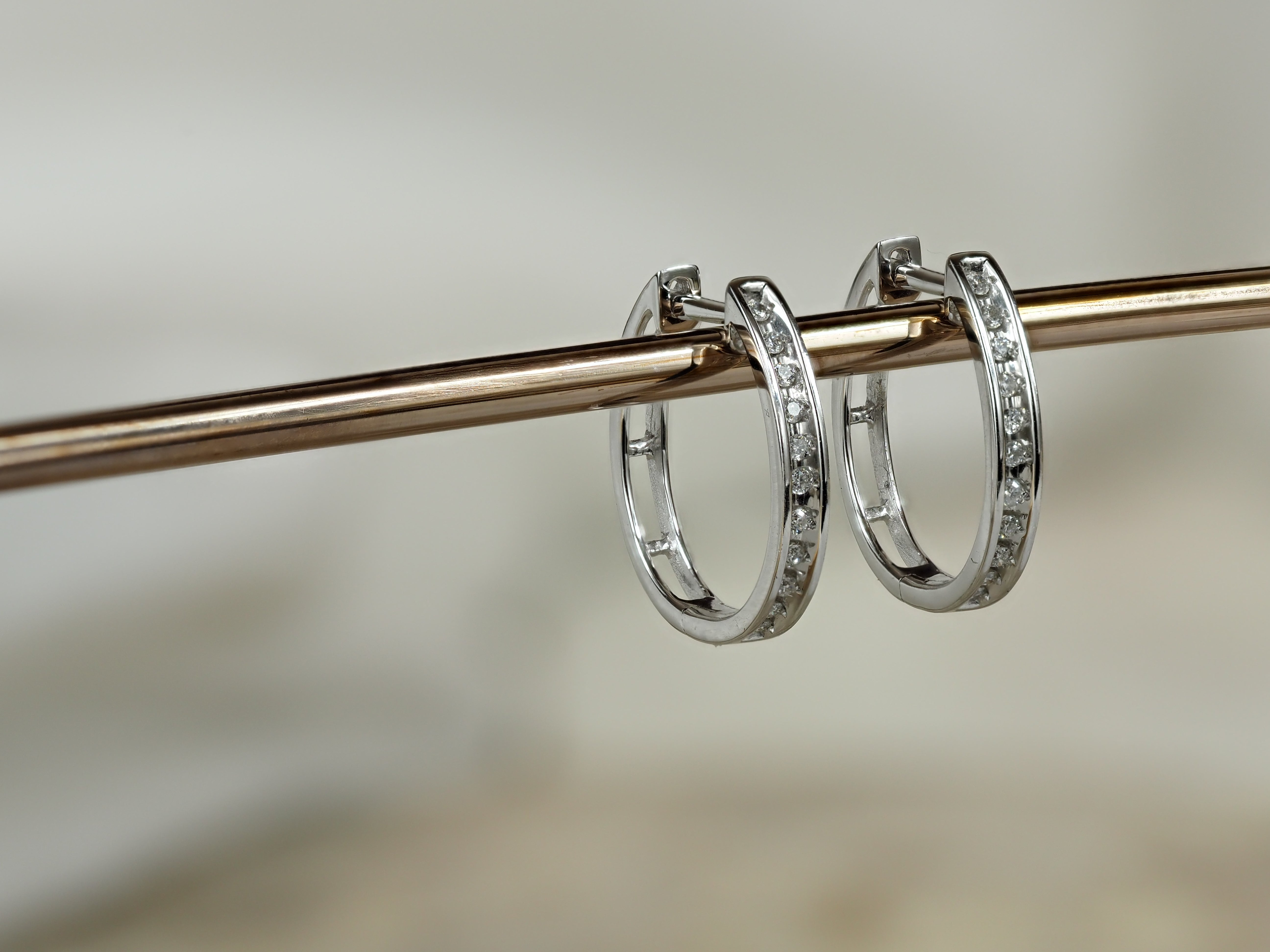 9ct White Gold 0.15Ct Diamond Oval Huggie Earrings