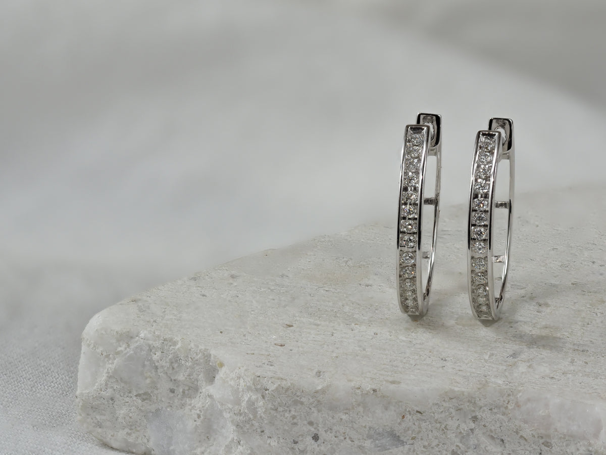 9ct White Gold 0.25ct Diamond Oval Huggie Earrings