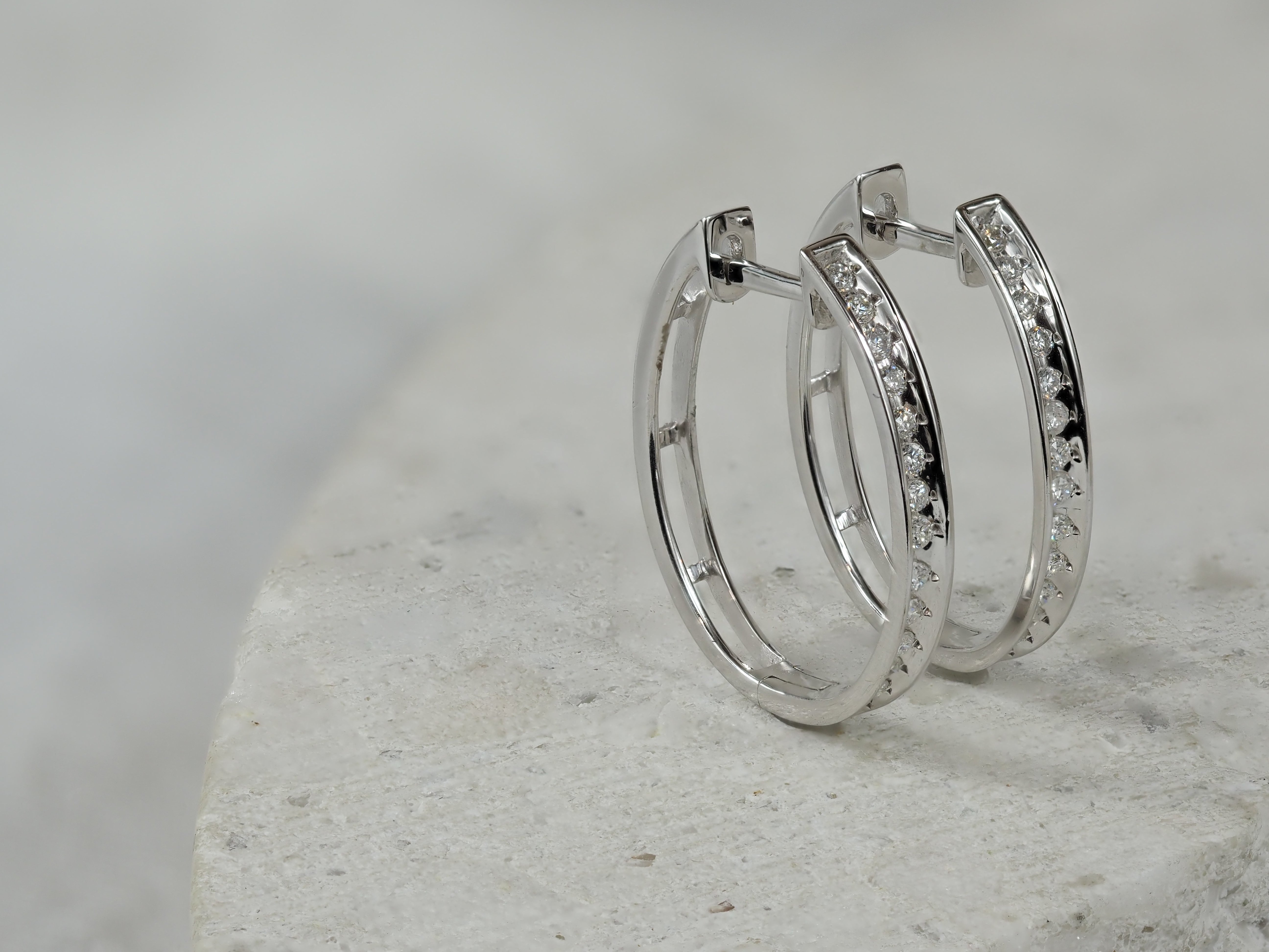 9ct White Gold 0.25ct Diamond Oval Huggie Earrings