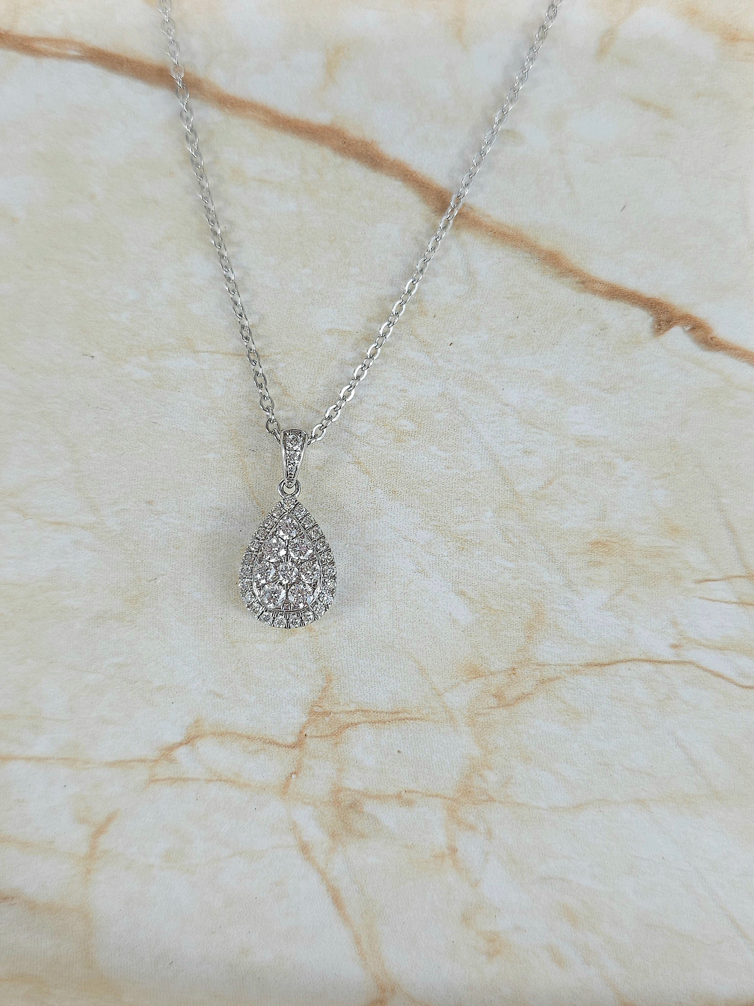 9ct White Gold Pear Shaped cluster Diamond pendant, equaling 0.52ct