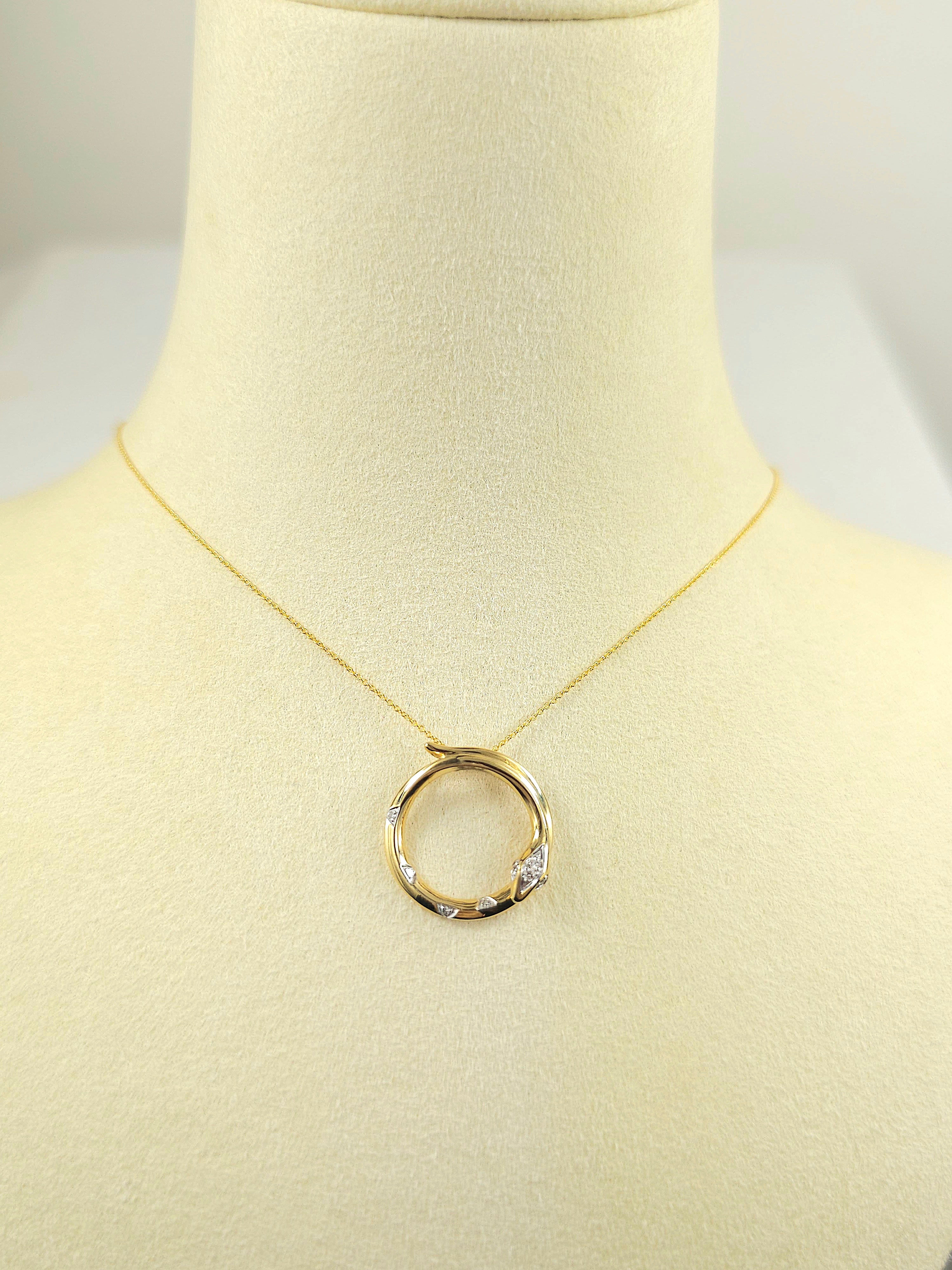 9ct Yellow and White Gold Diamond set circle snake pendant