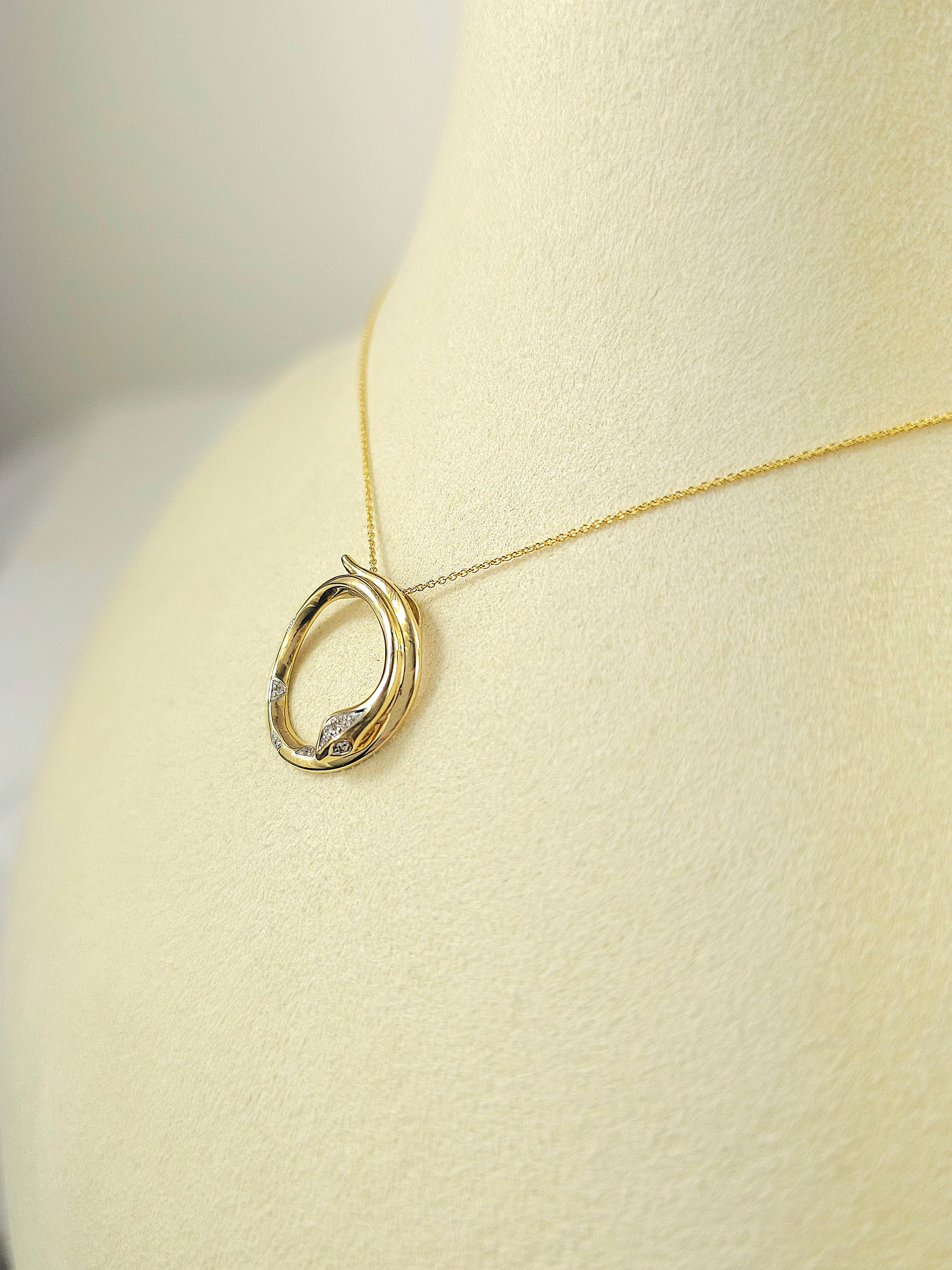 9ct Yellow and White Gold Diamond set circle snake pendant