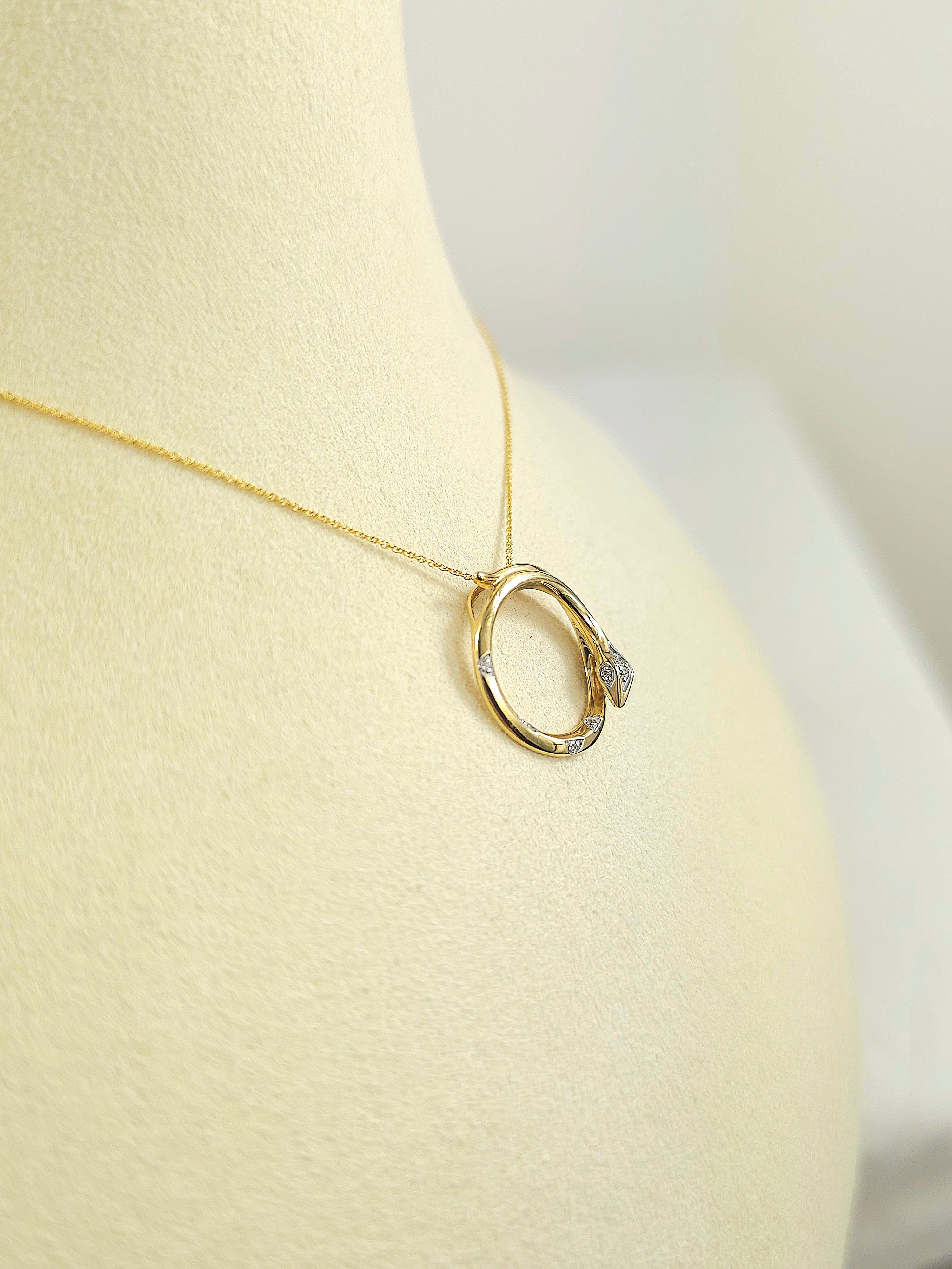 9ct Yellow and White Gold Diamond set circle snake pendant