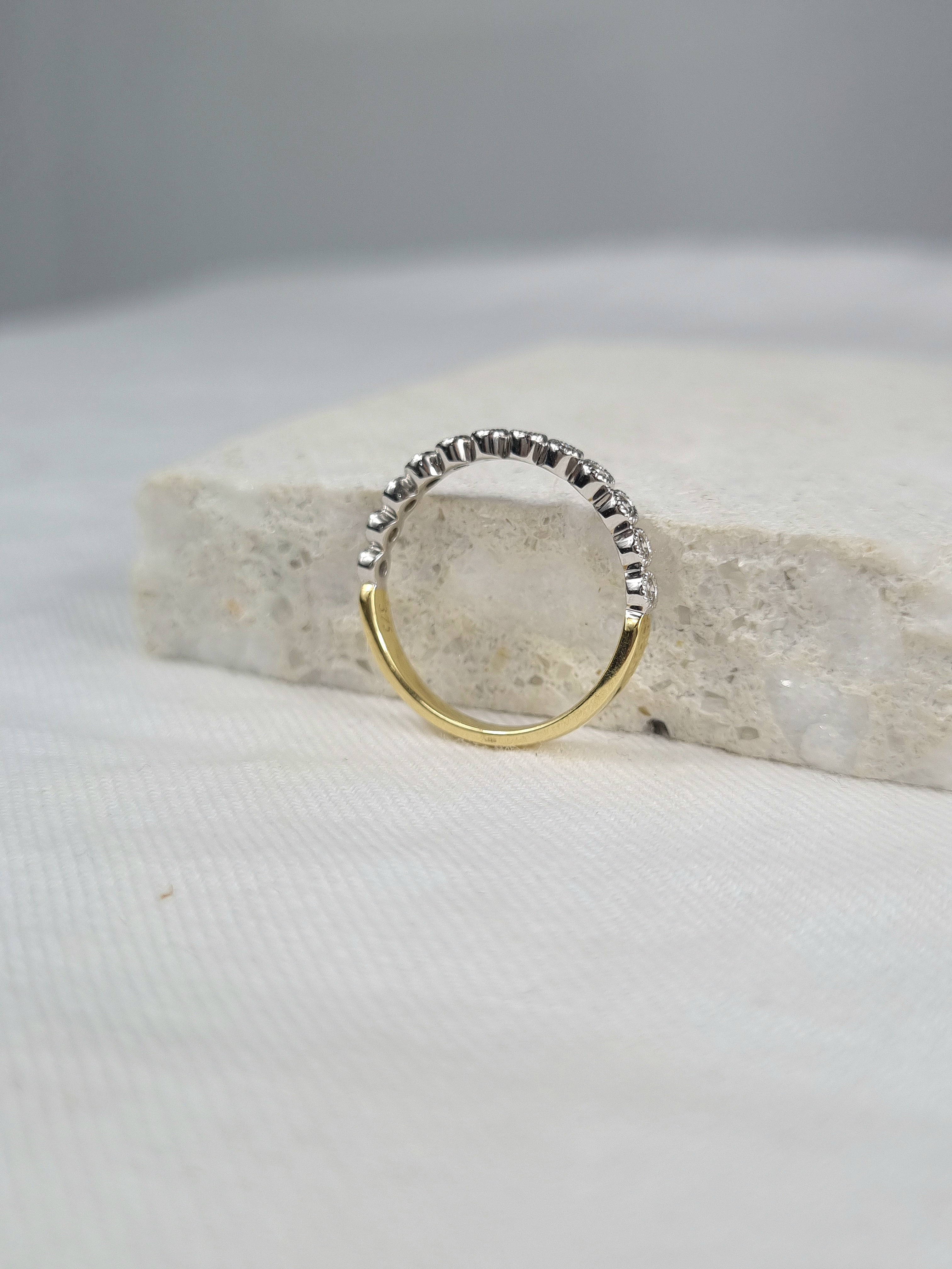 9ct Yellow and White gold Vintage style ring, equaling 0.22ct