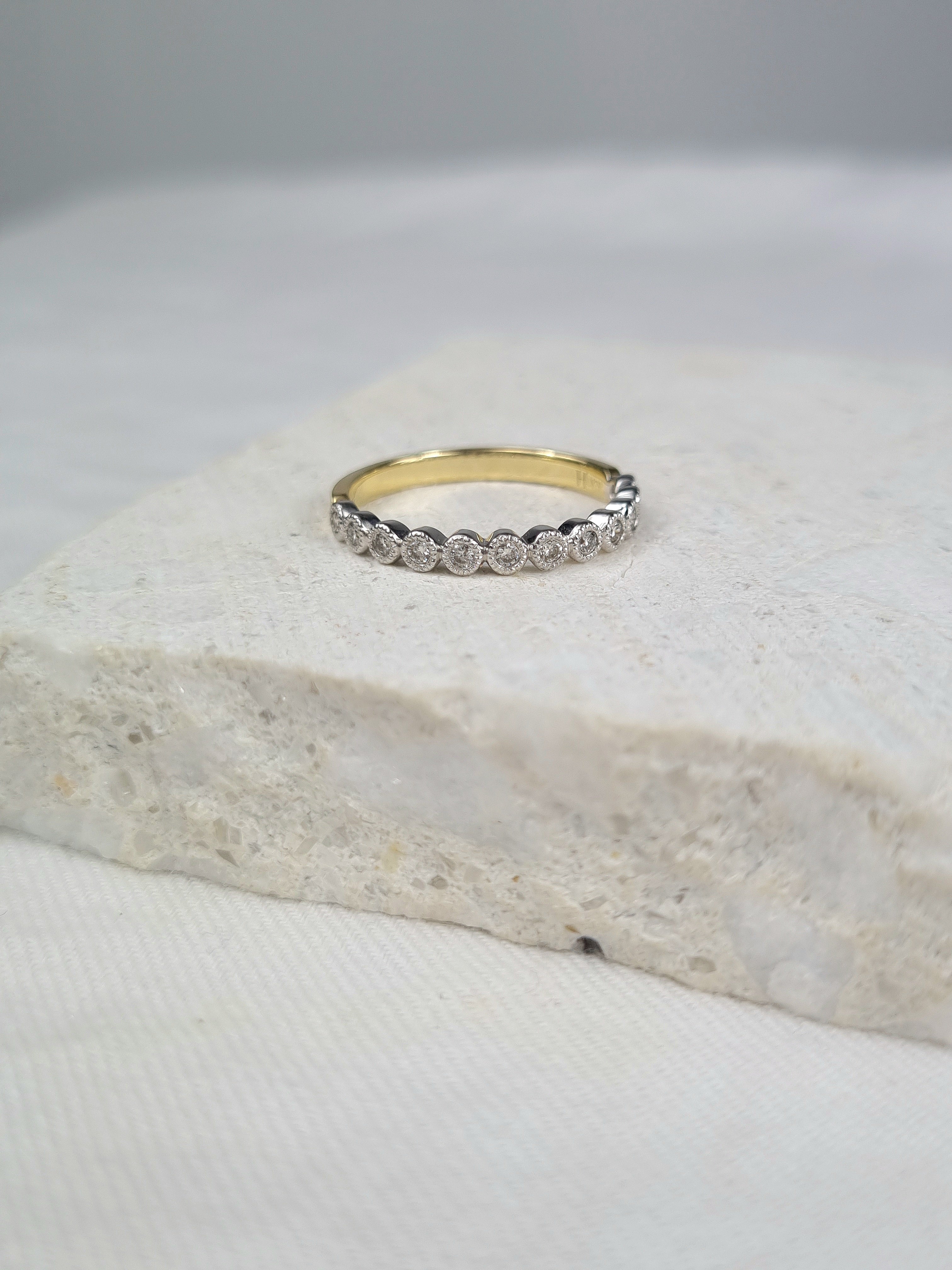 9ct Yellow and White gold Vintage style ring, equaling 0.22ct