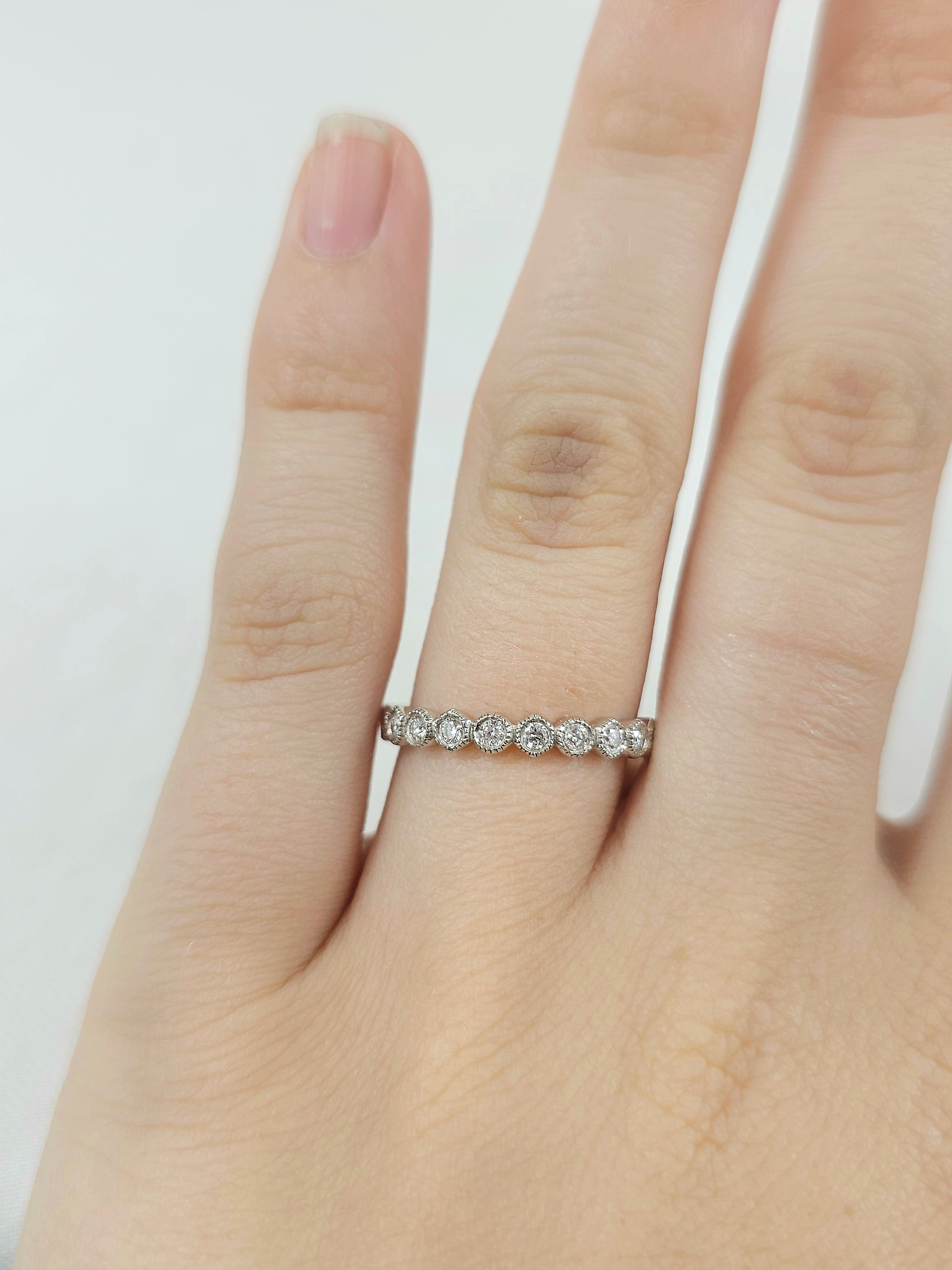 9ct White Gold Vintage Style band, with Round Diamonds equaling 0.33ct