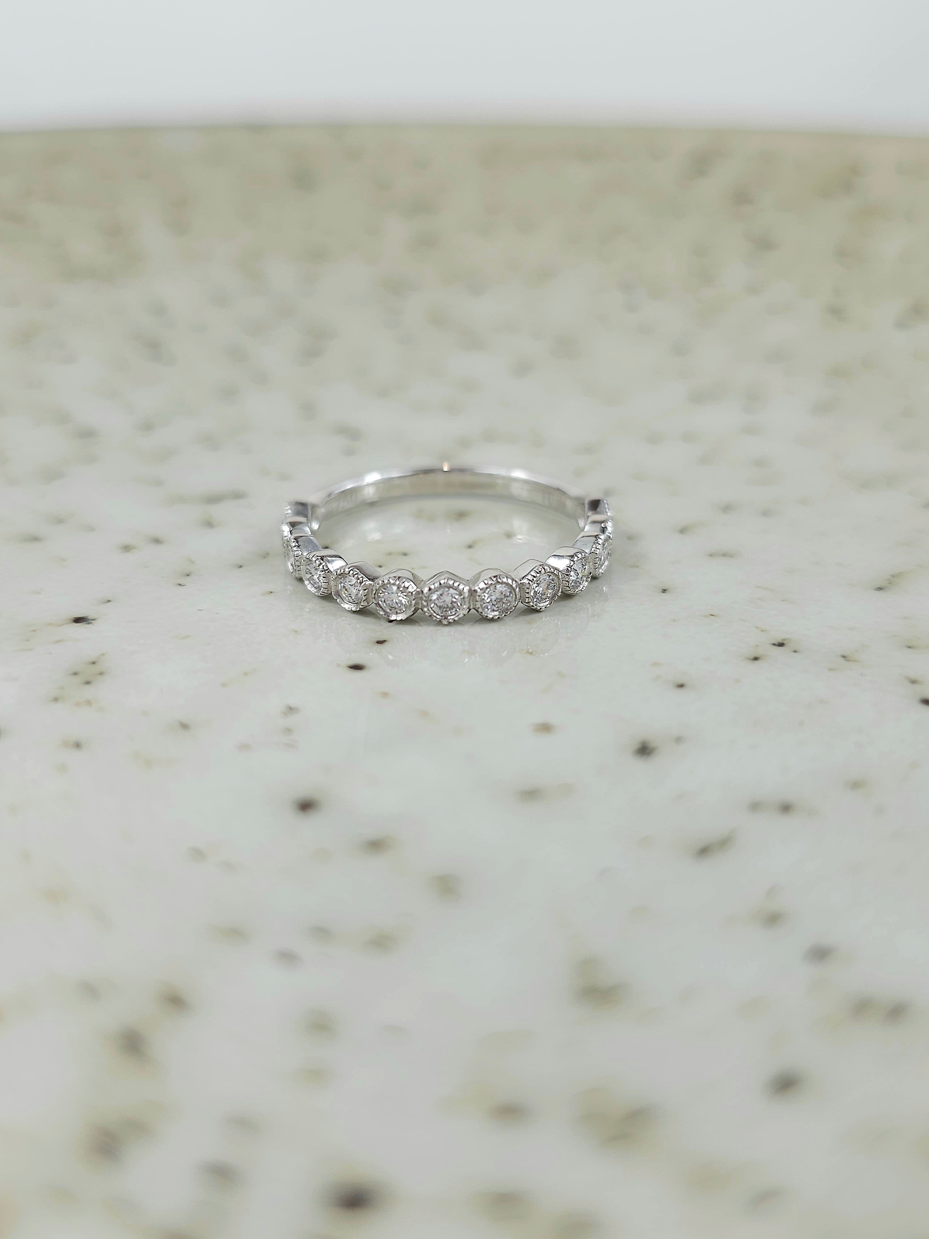 9ct White Gold Vintage Style band, with Round Diamonds equaling 0.33ct