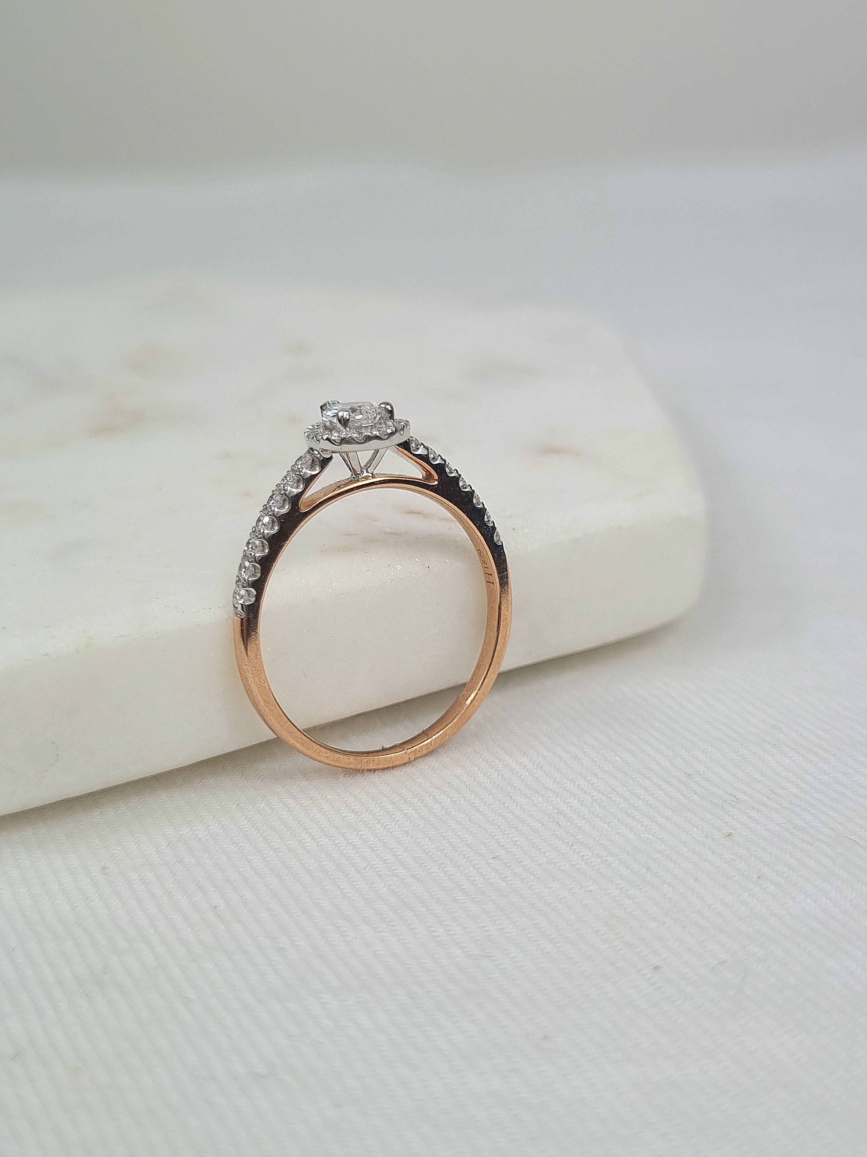 9ct Rose and White Gold Pear cut Diamond halo engagement ring