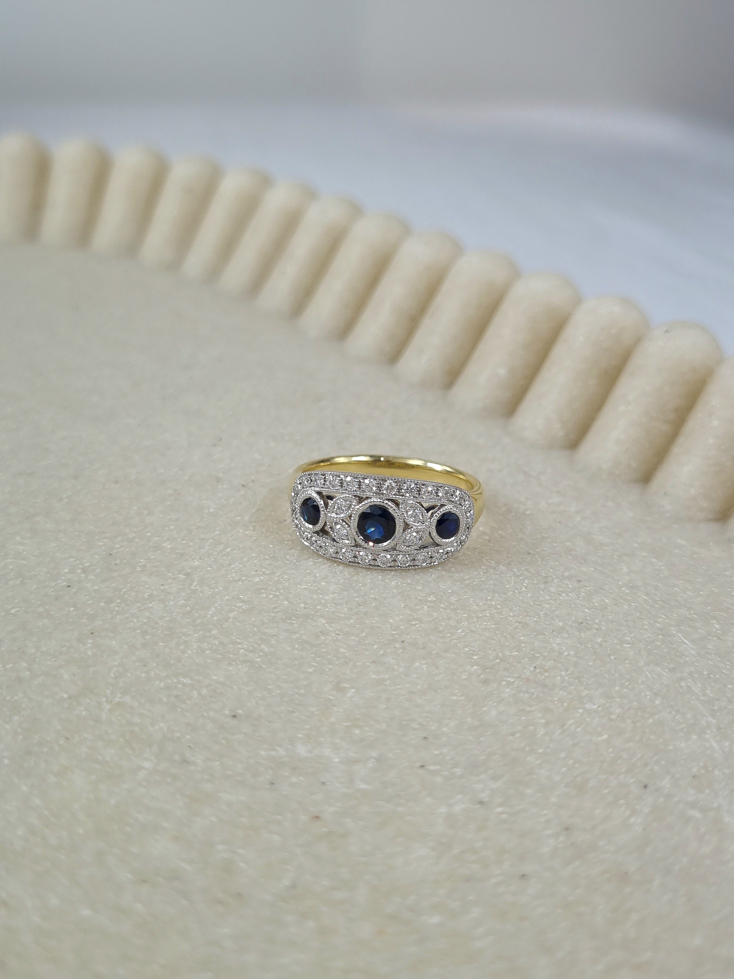 18ct Yellow and White Gold Sapphire and Diamond ring