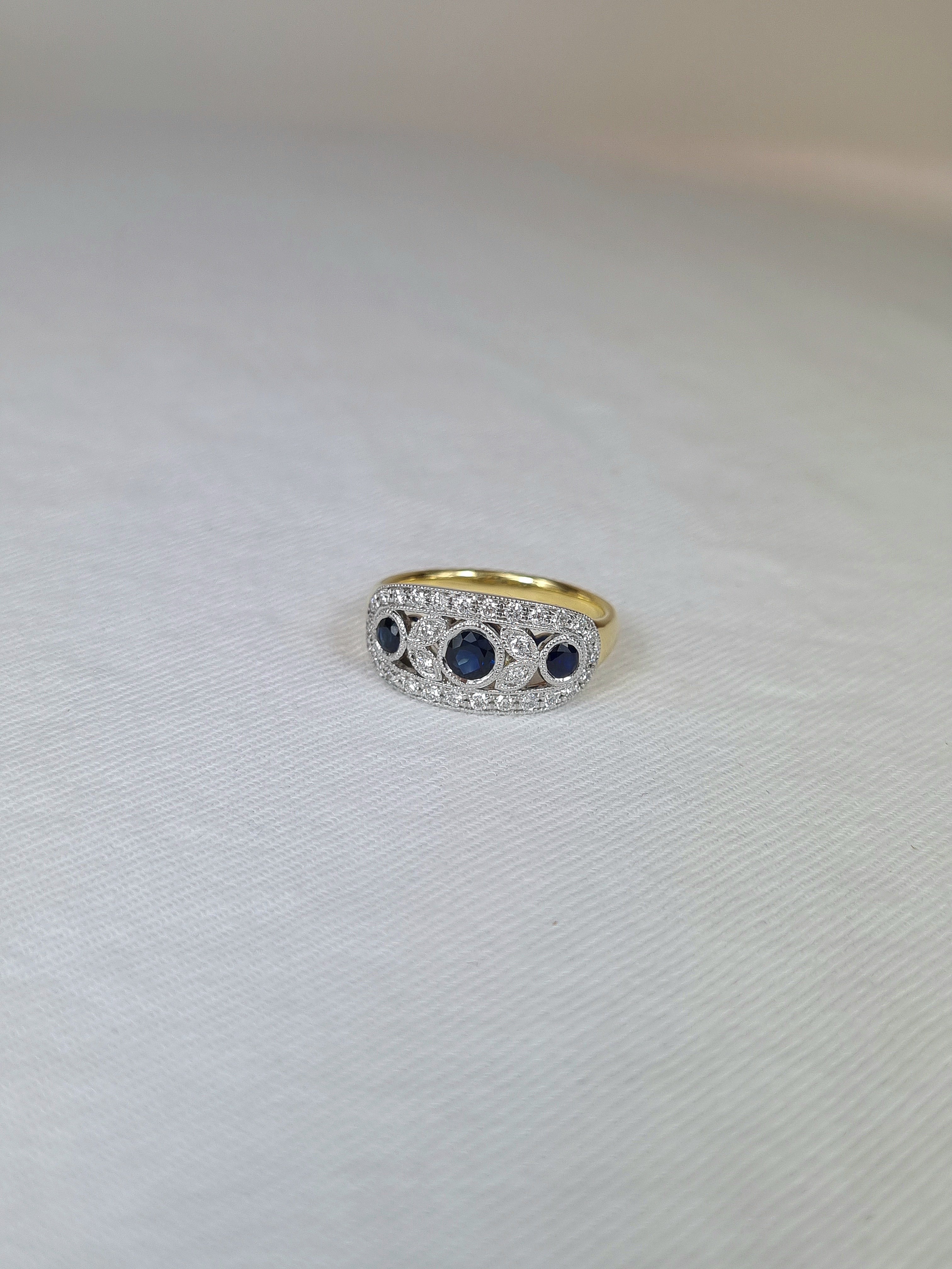 18ct Yellow and White Gold Sapphire and Diamond ring