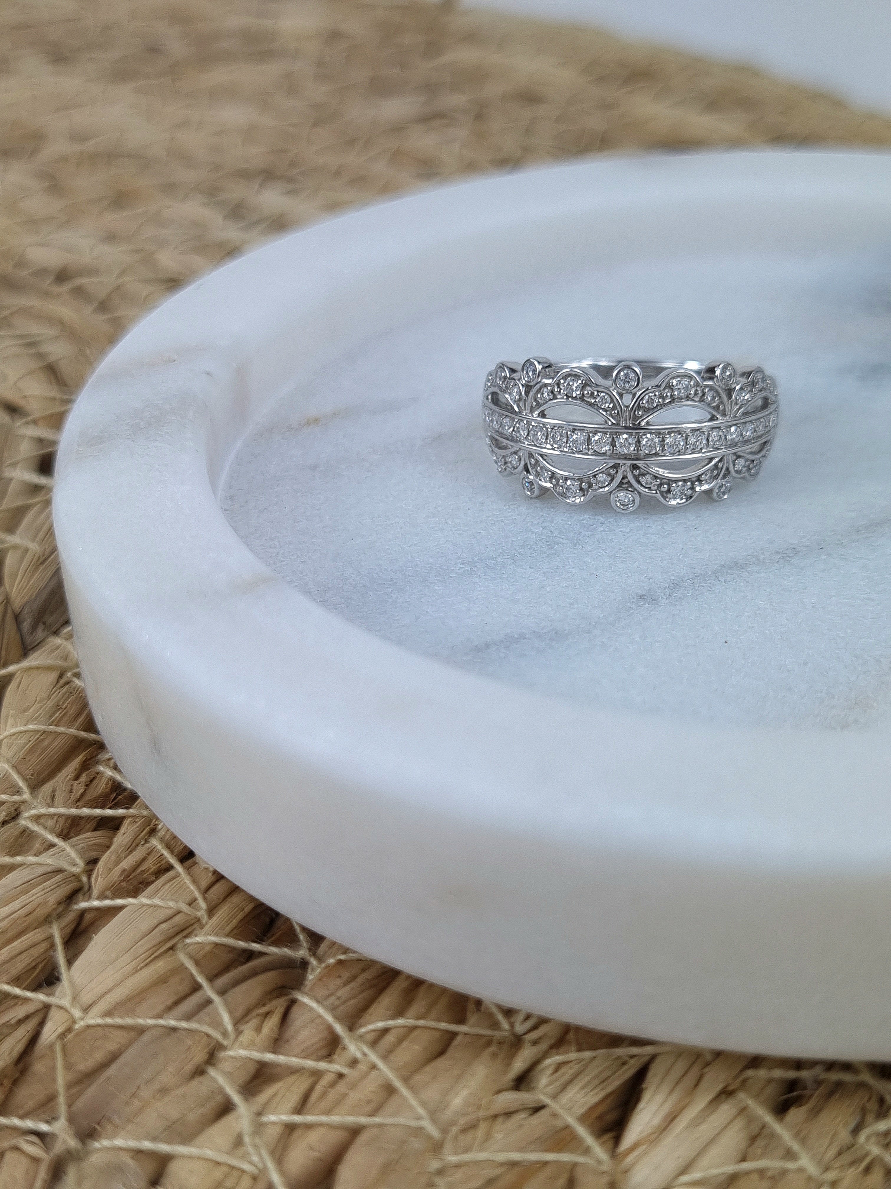 9ct White Gold filagree Diamond dress ring, equaling 0.37ct