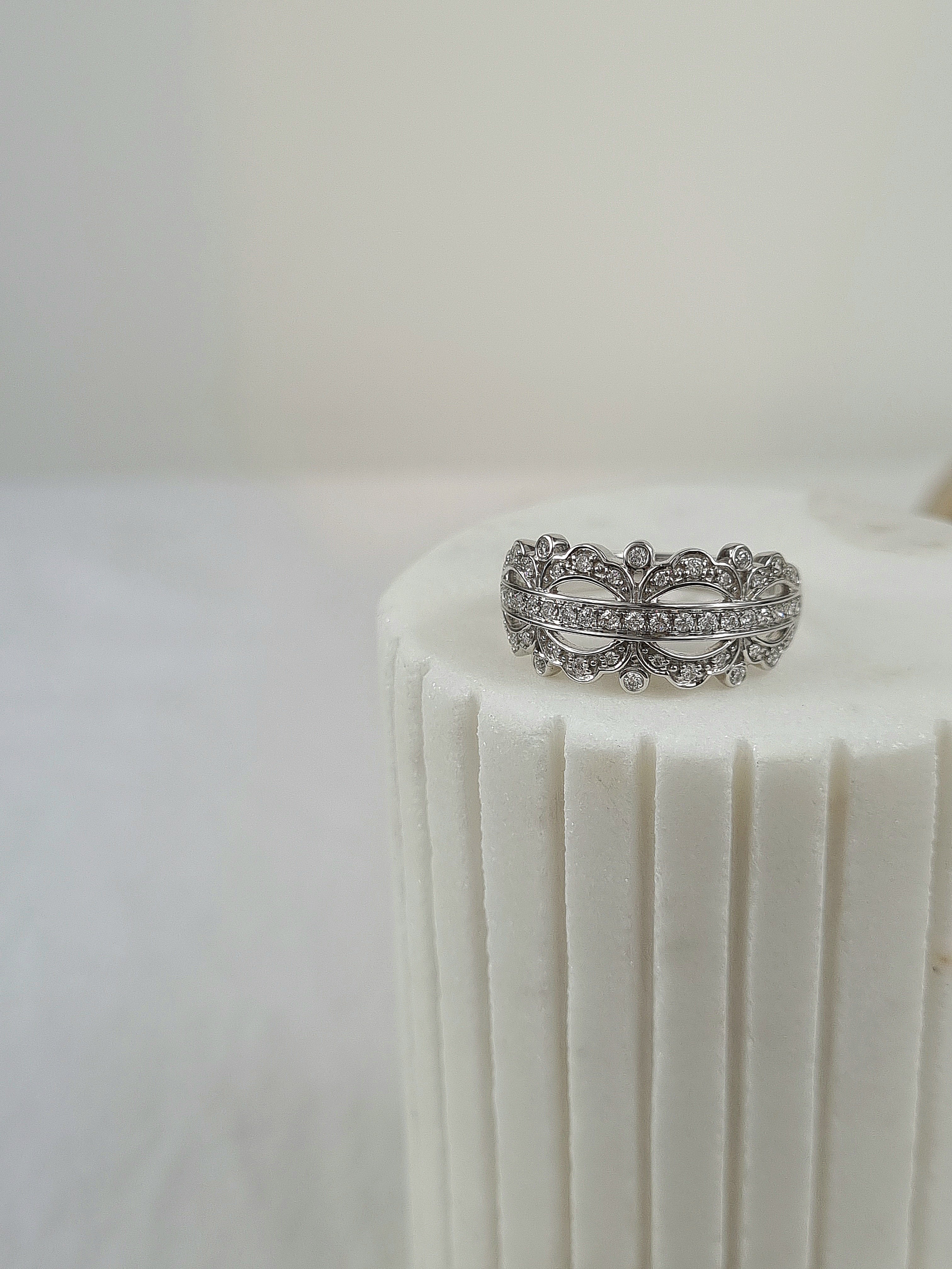 9ct White Gold filagree Diamond dress ring, equaling 0.37ct