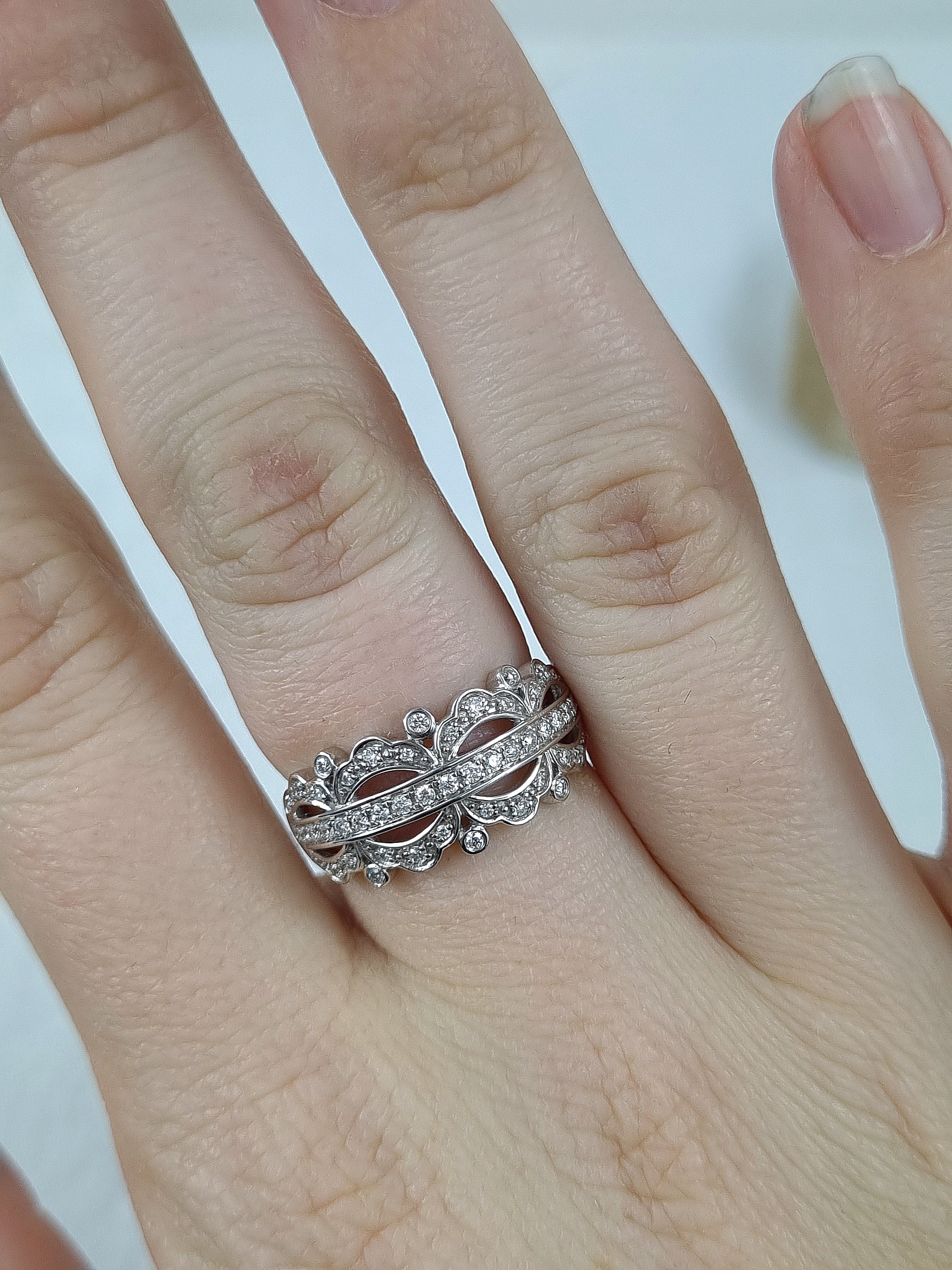 9ct White Gold filagree Diamond dress ring, equaling 0.37ct