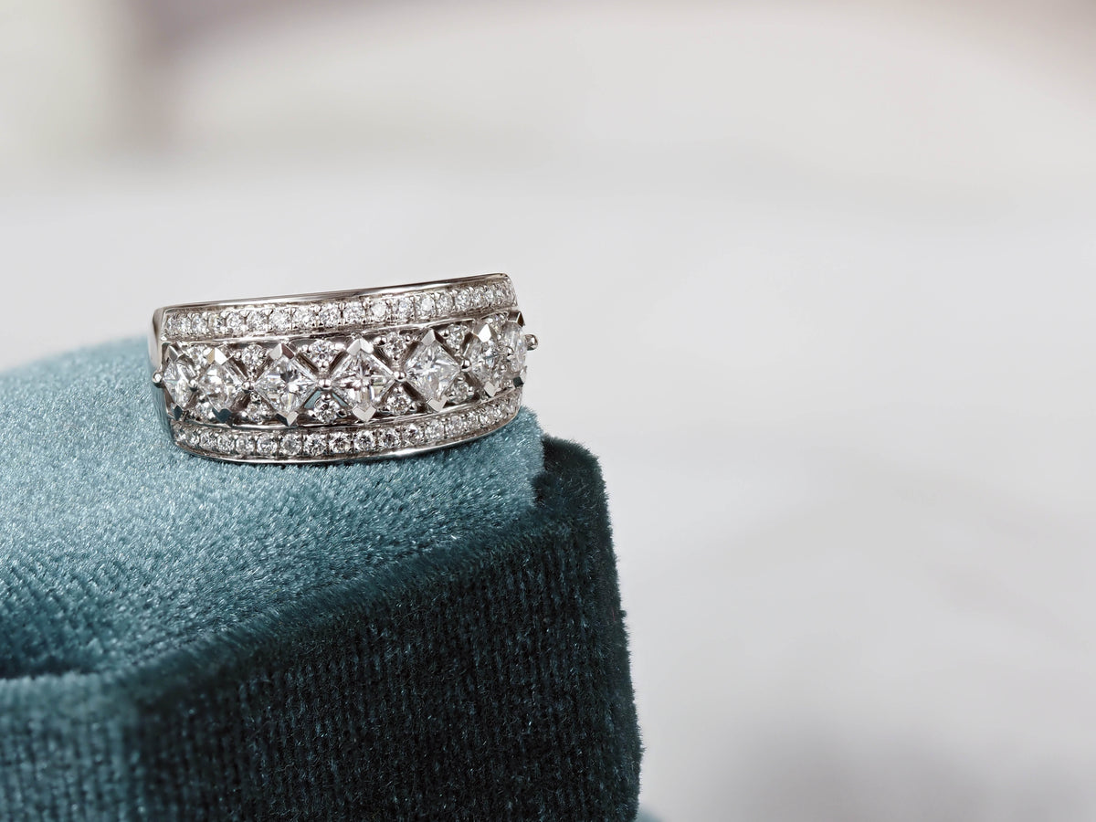 18 Carat White Gold Wide Princess Cut Ring, 1.04 Carats Total.