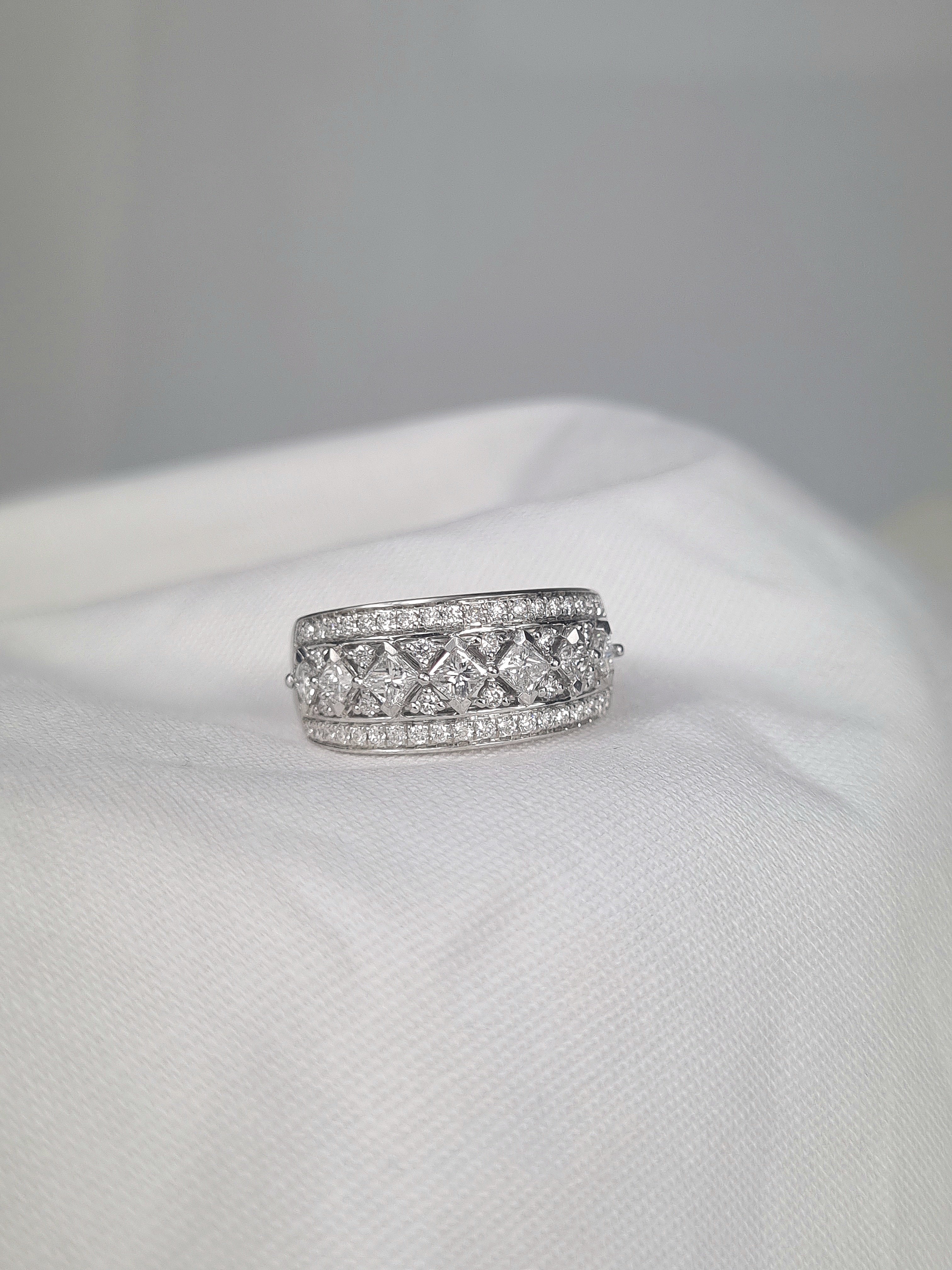18 Carat White Gold Wide Princess Cut Ring, 1.04 Carats Total.