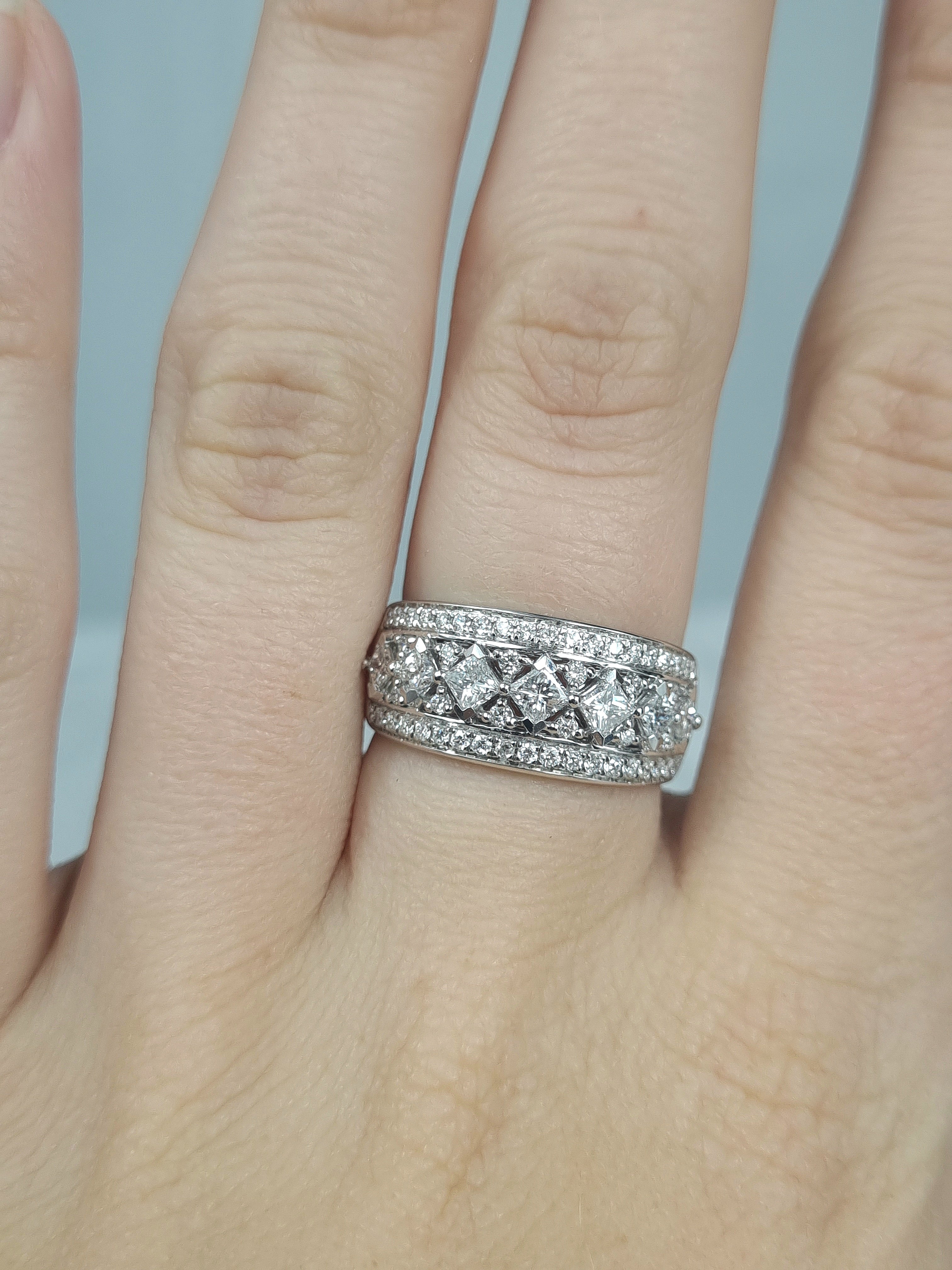 18 Carat White Gold Wide Princess Cut Ring, 1.04 Carats Total.