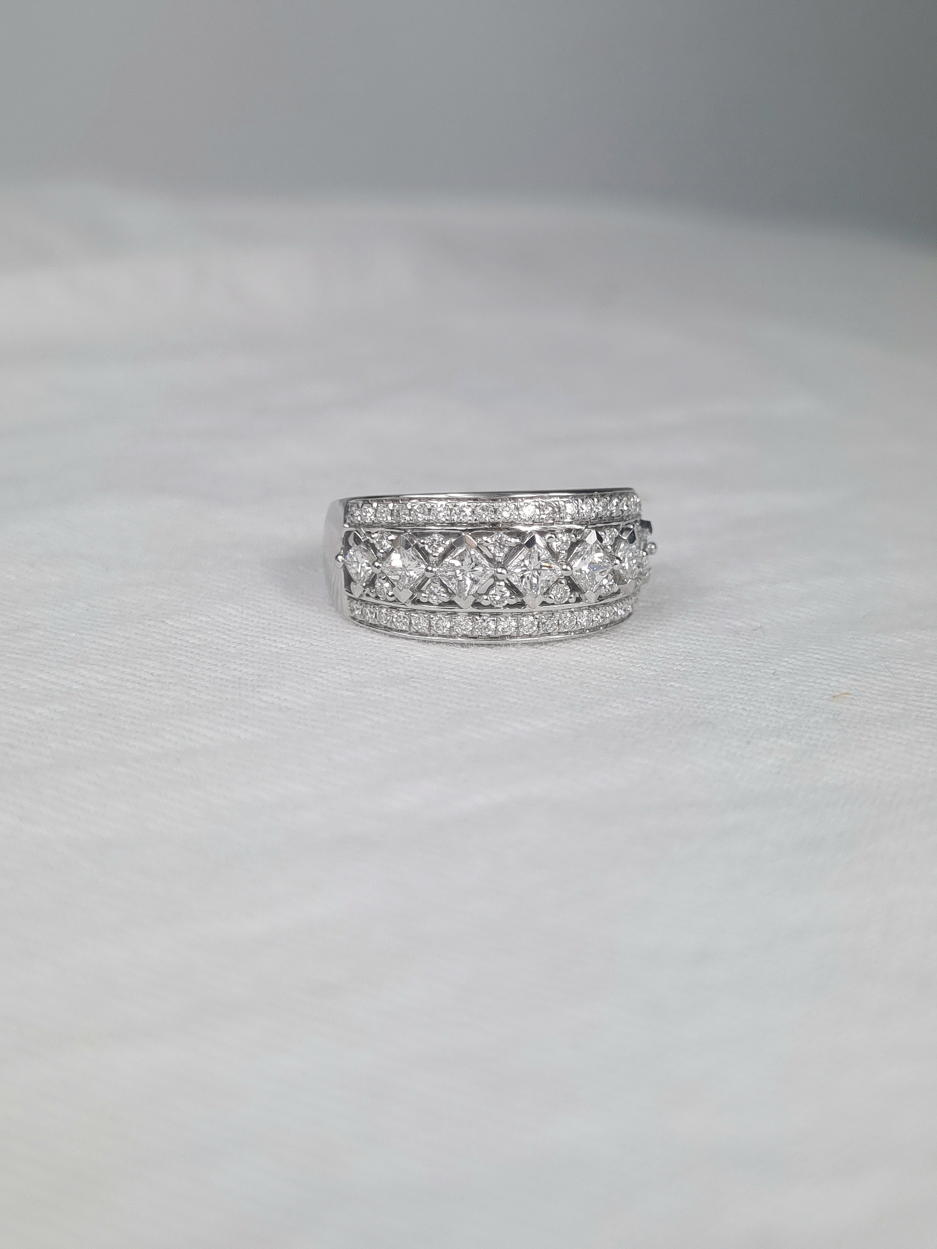 18 Carat White Gold Wide Princess Cut Ring, 1.04 Carats Total.