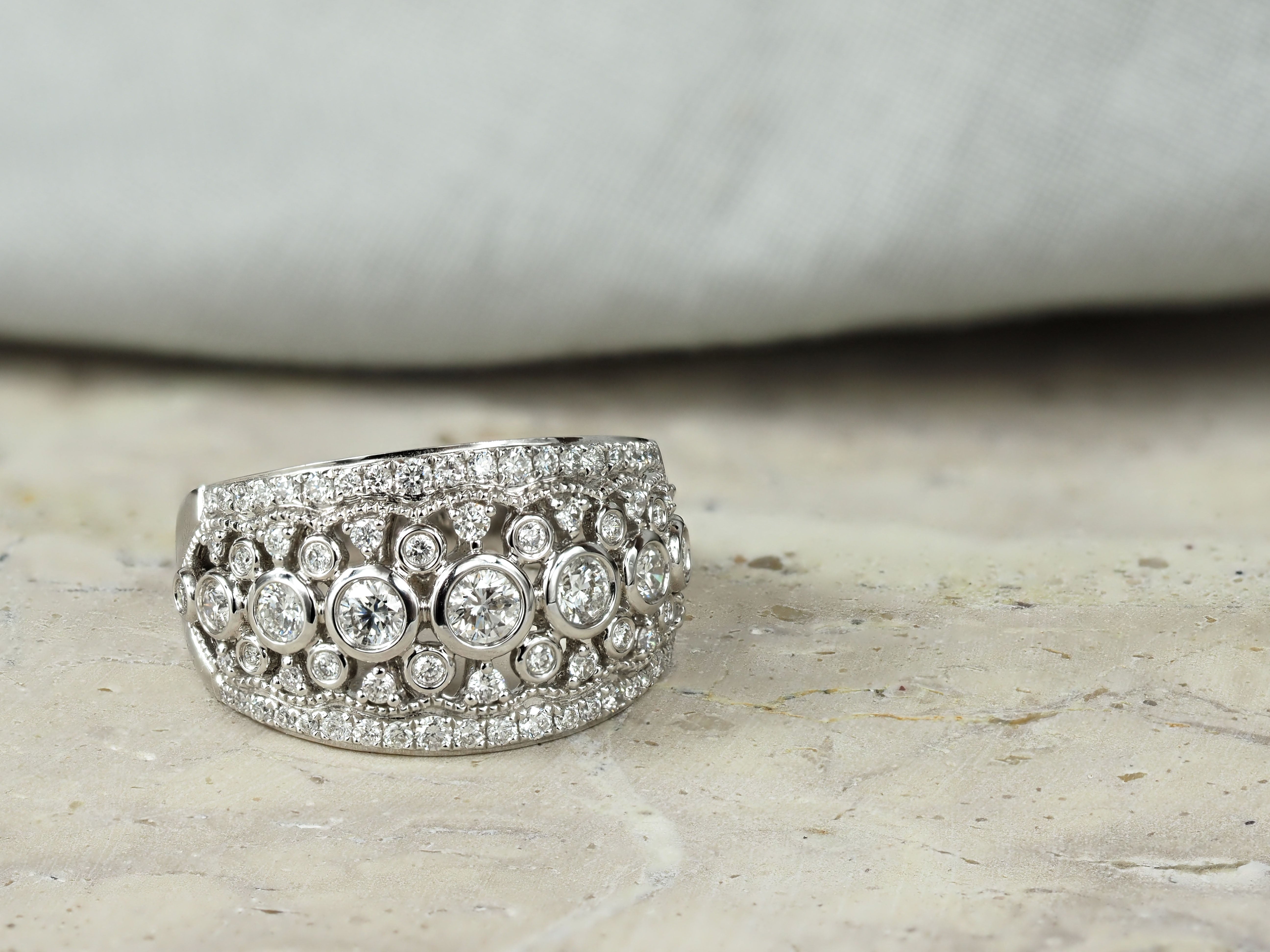 18ct White Gold Filigree Diamond Dress Ring, 1.01 carats total.
