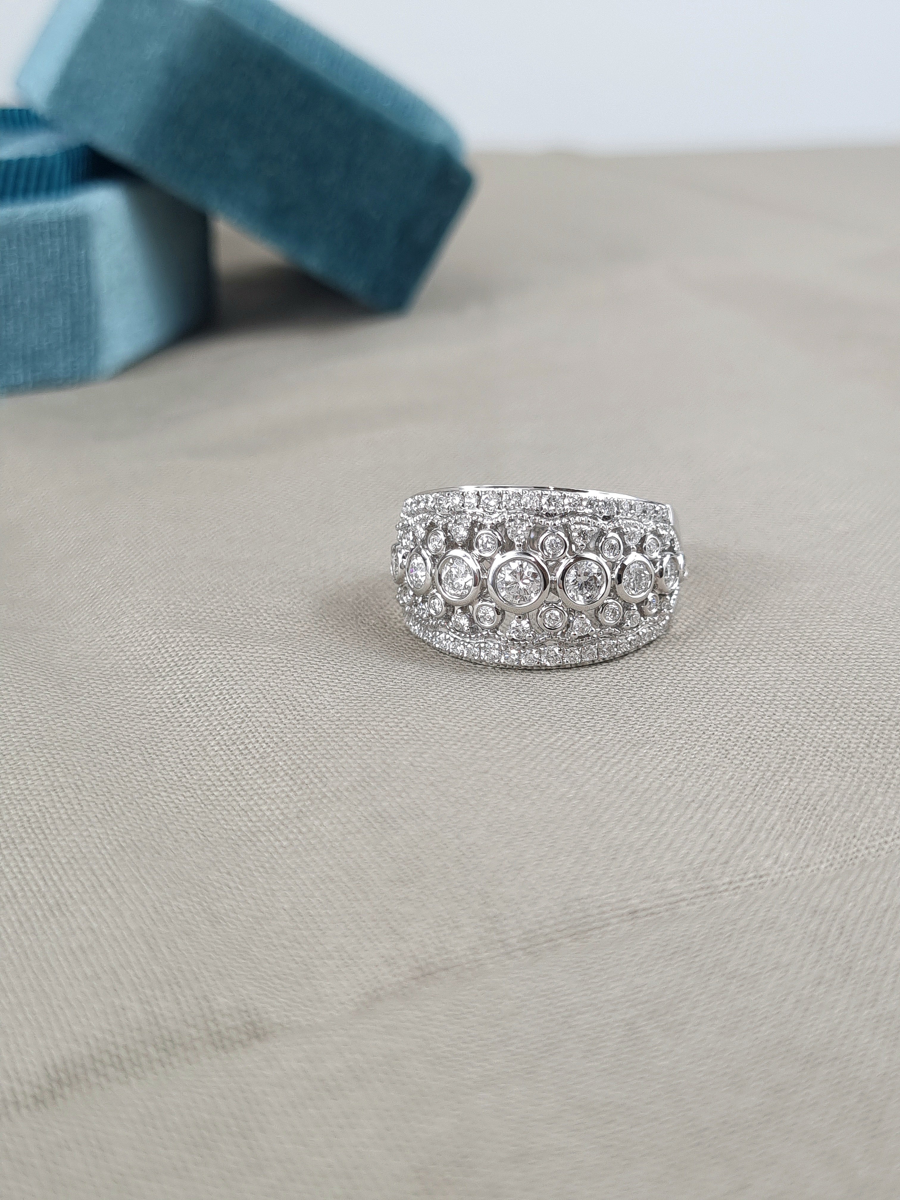 18ct White Gold Filigree Diamond Dress Ring, 1.01 carats total.