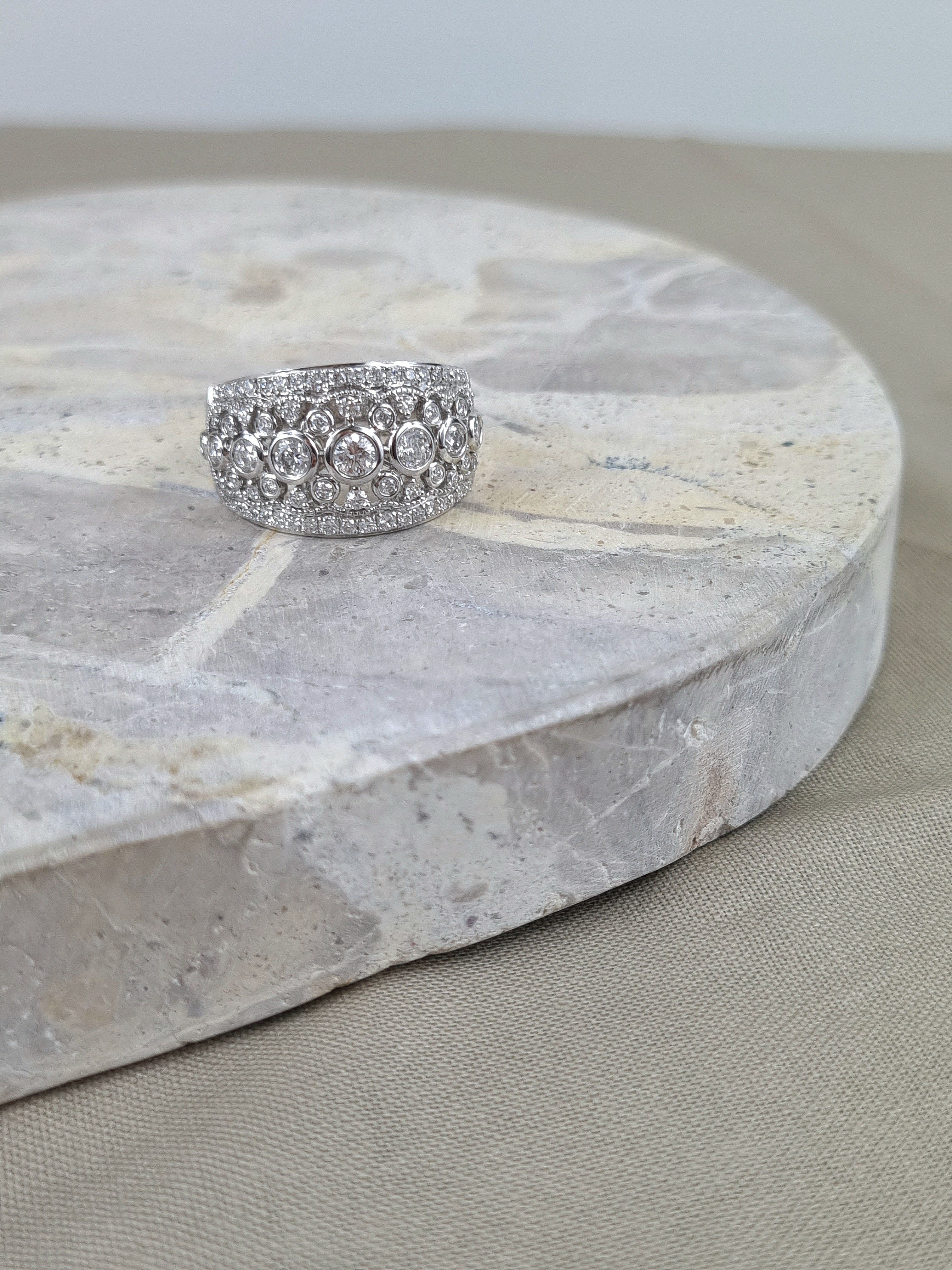 18ct White Gold Filigree Diamond Dress Ring, 1.01 carats total.