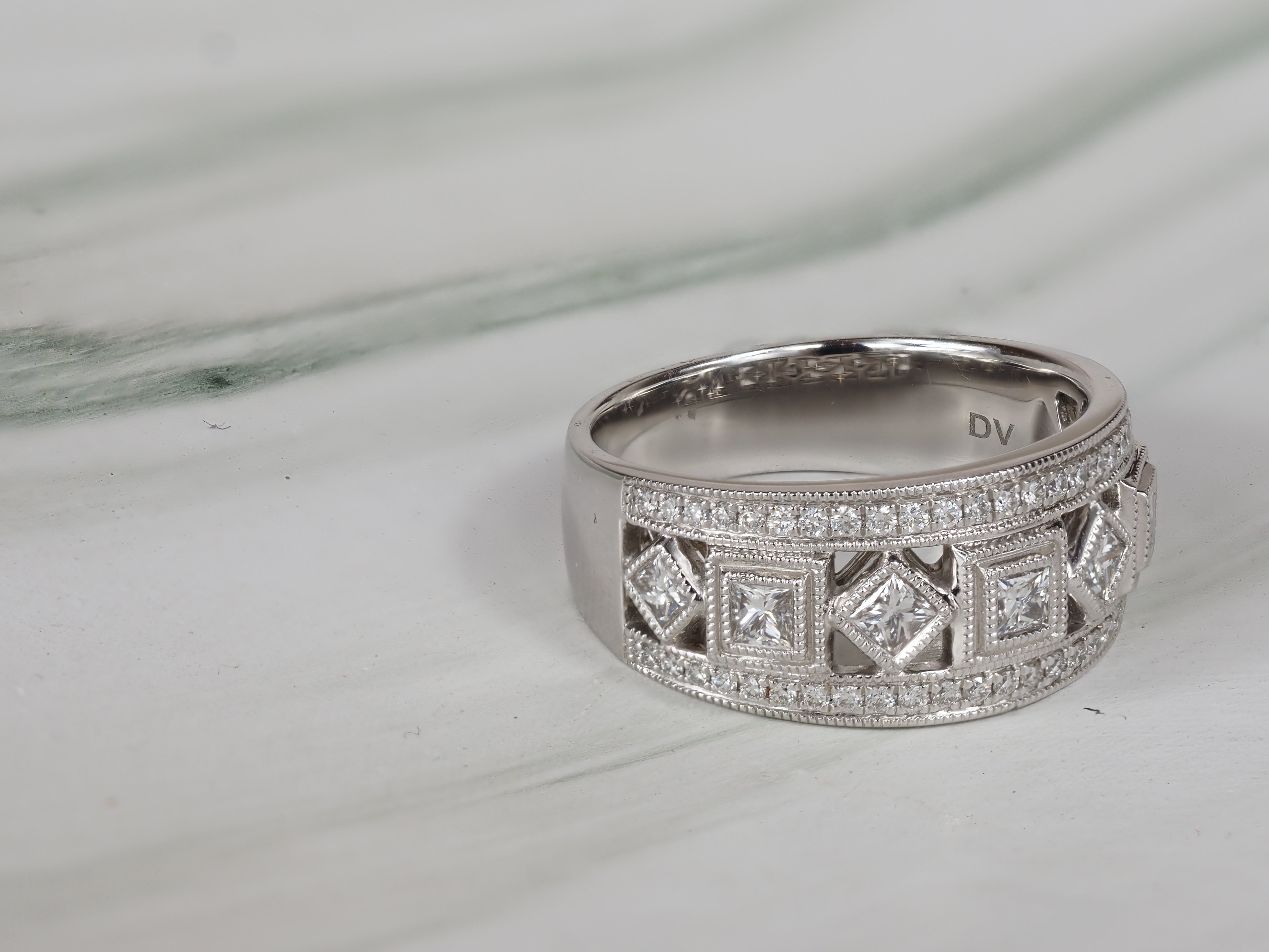 18ct White Gold Round Brilliant and Princess Cut Diamond Dress Ring