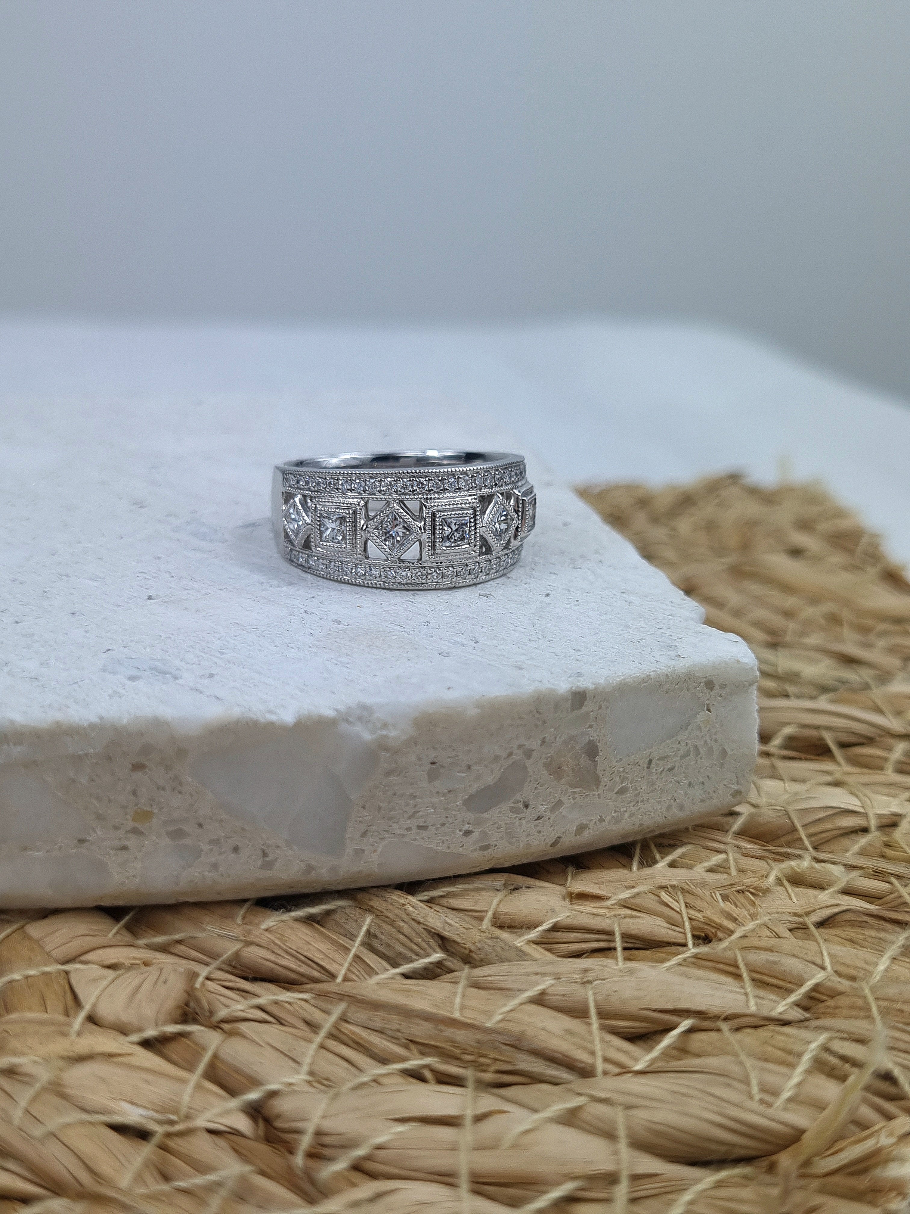 18ct White Gold Round Brilliant and Princess Cut Diamond Dress Ring