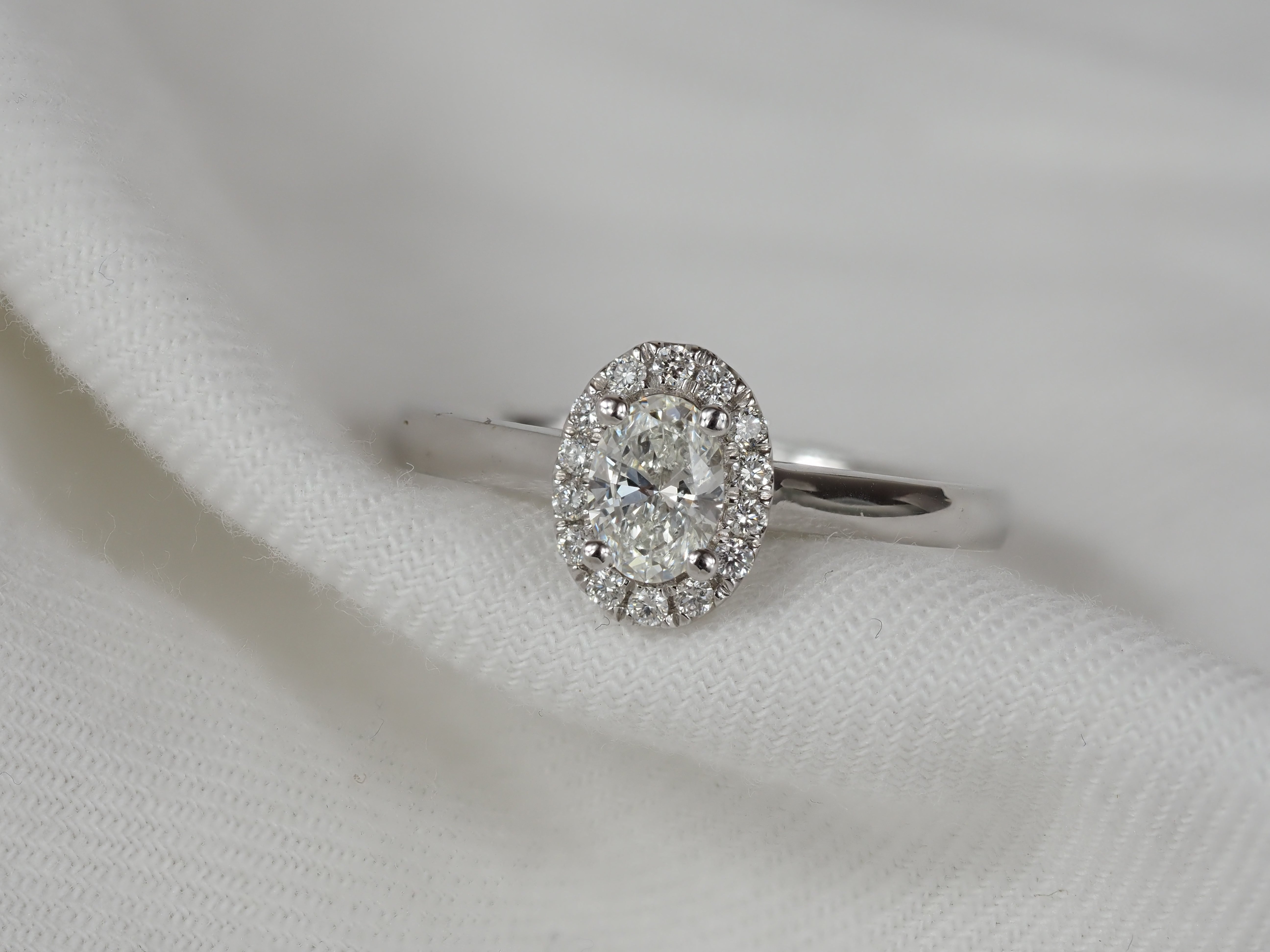 18ct White Gold Oval Cut Diamond Engagement ring, 0.40ct centre