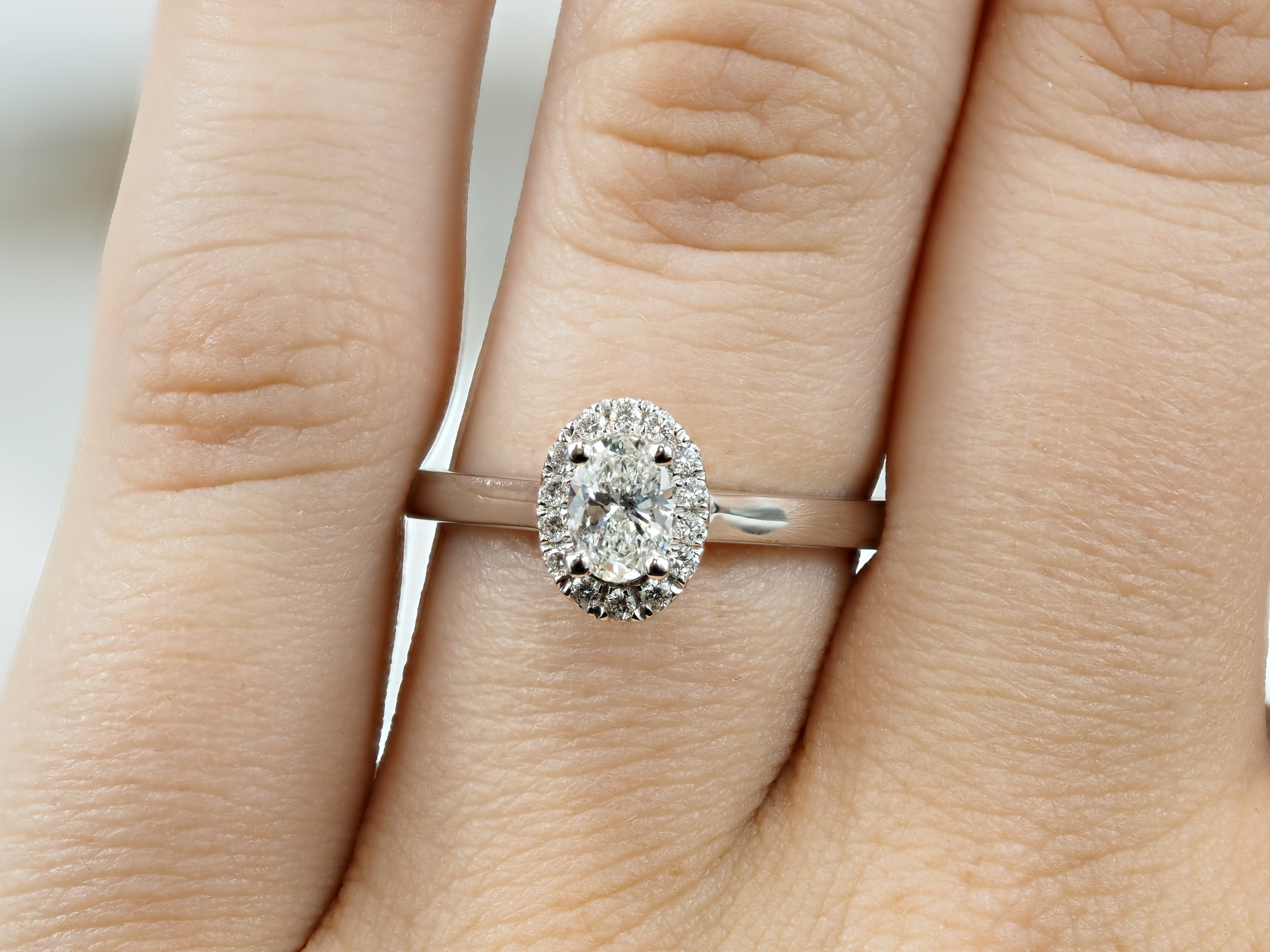 18ct White Gold Oval Cut Diamond Engagement ring, 0.40ct centre