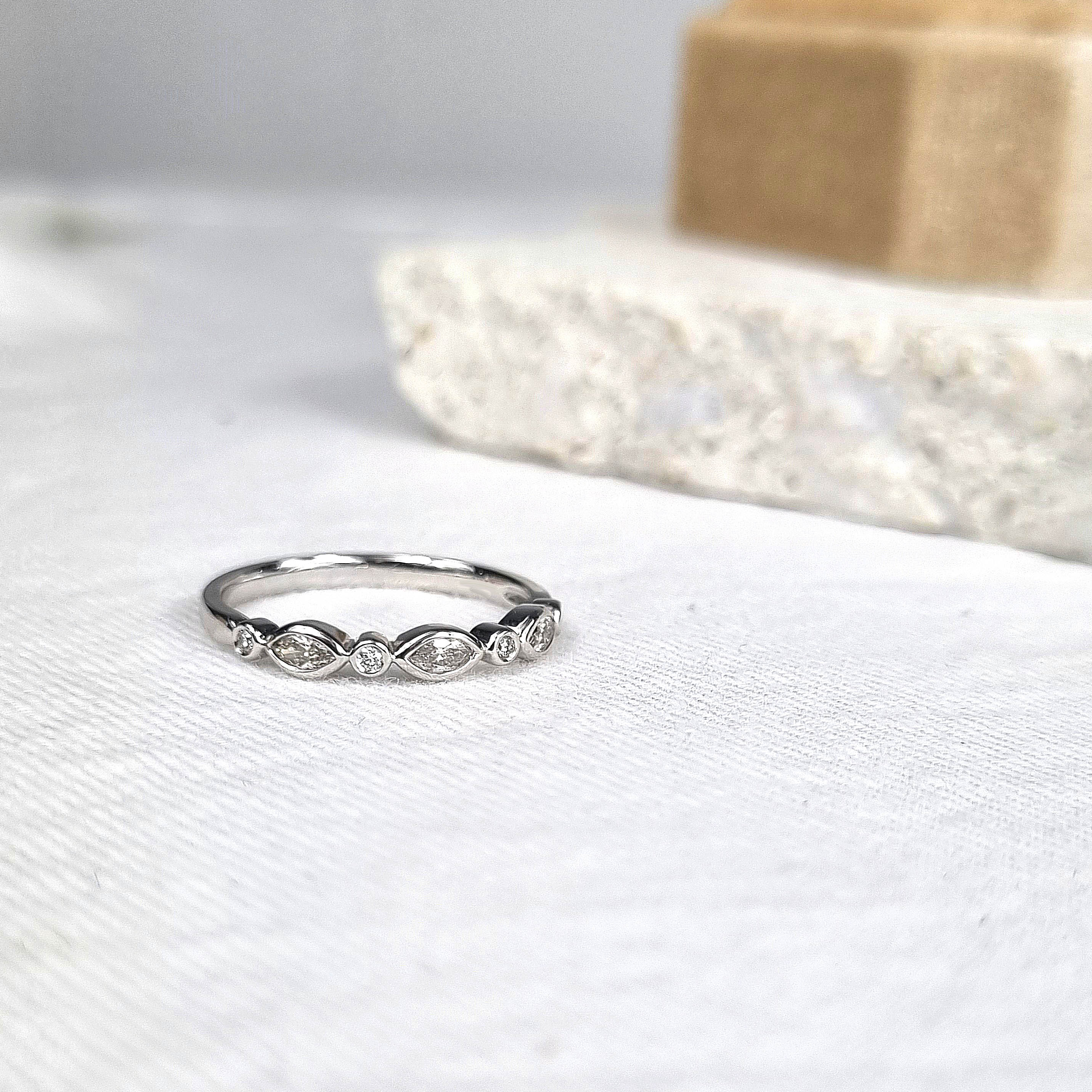 18ct White Gold Round and Marquis Diamond Band, 0.20ct total