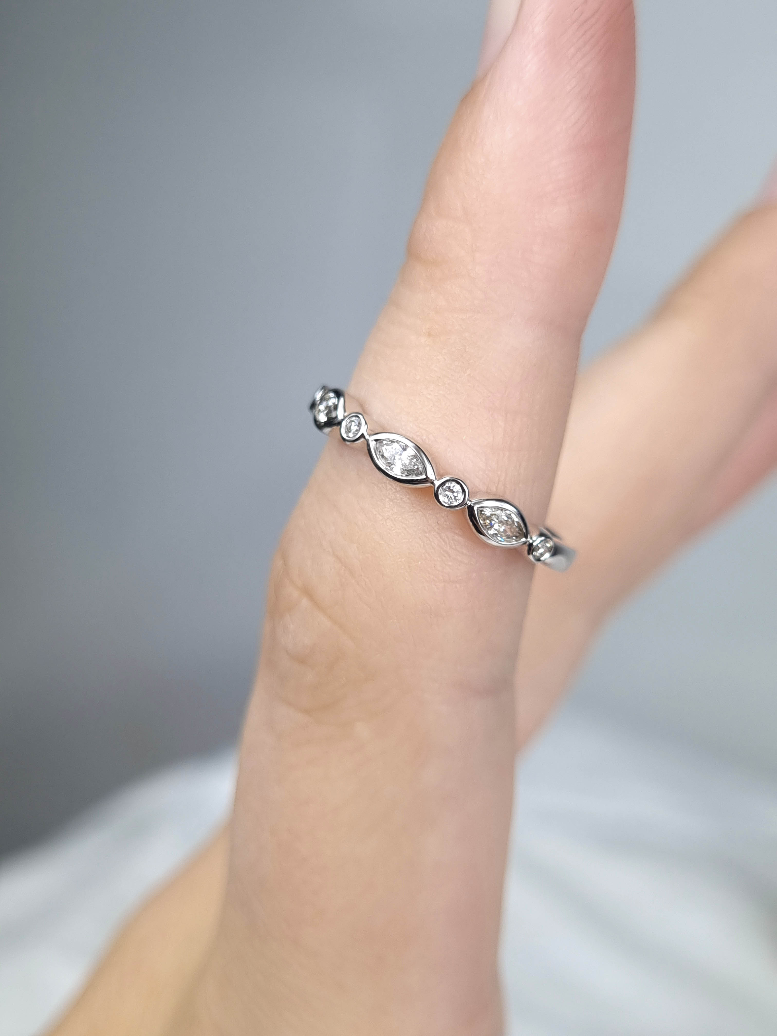 18ct White Gold Round and Marquis Diamond Band, 0.20ct total