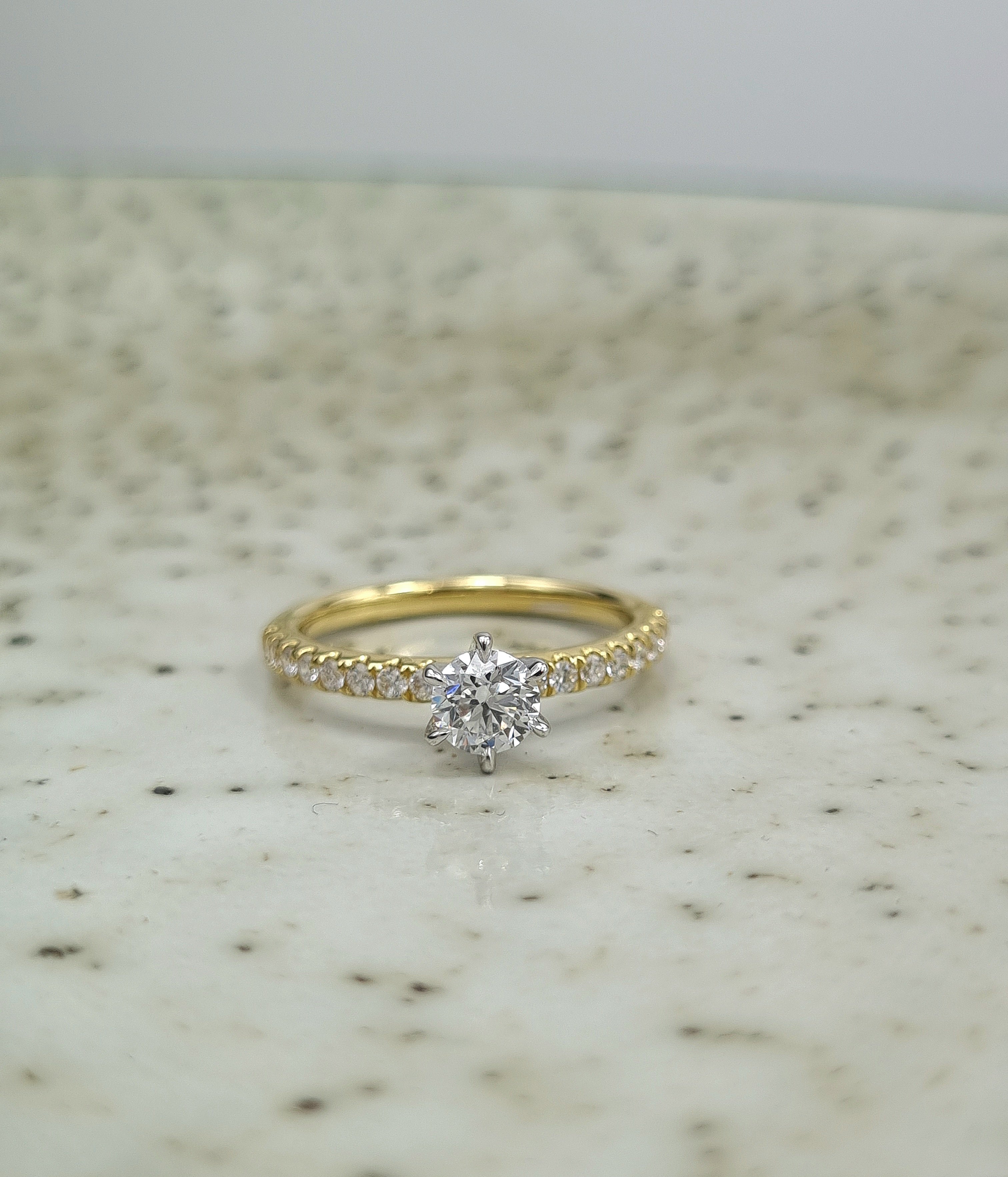18ct Yellow and White gold Natural Round Brillant cut Diamond engagement ring, 0.59 carat centre