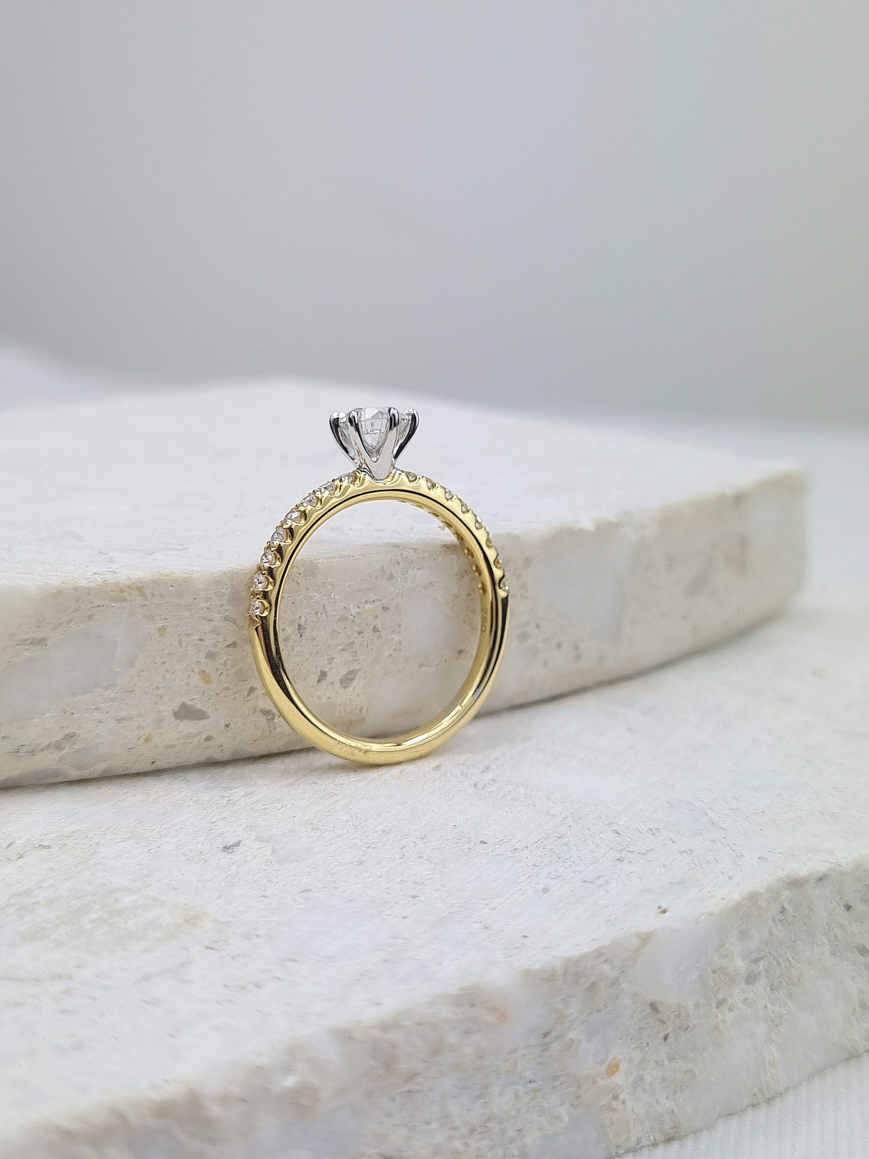 18ct Yellow and White gold Natural Round Brillant cut Diamond engagement ring, 0.59 carat centre