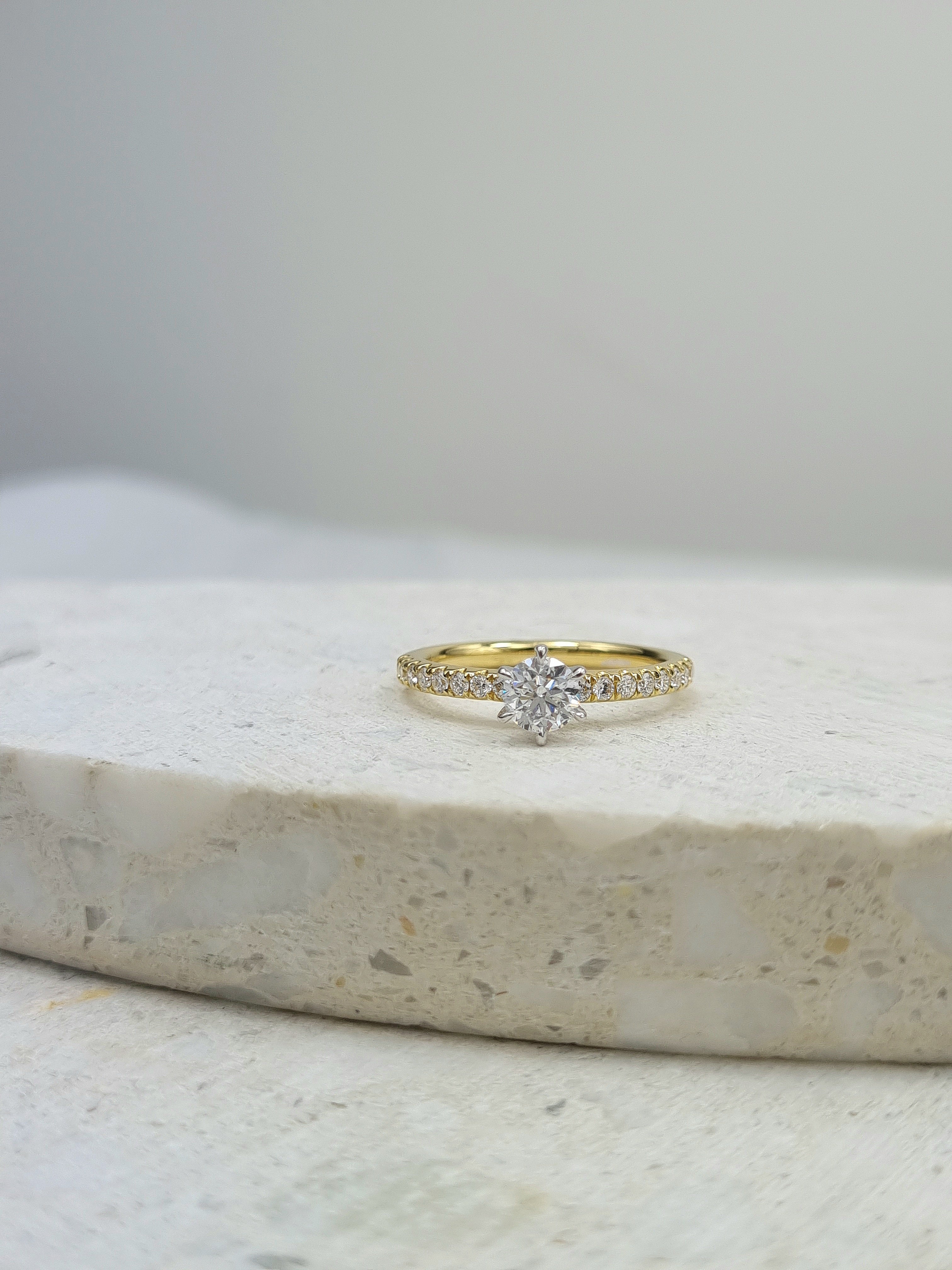 18ct Yellow and White gold Natural Round Brillant cut Diamond engagement ring, 0.59 carat centre