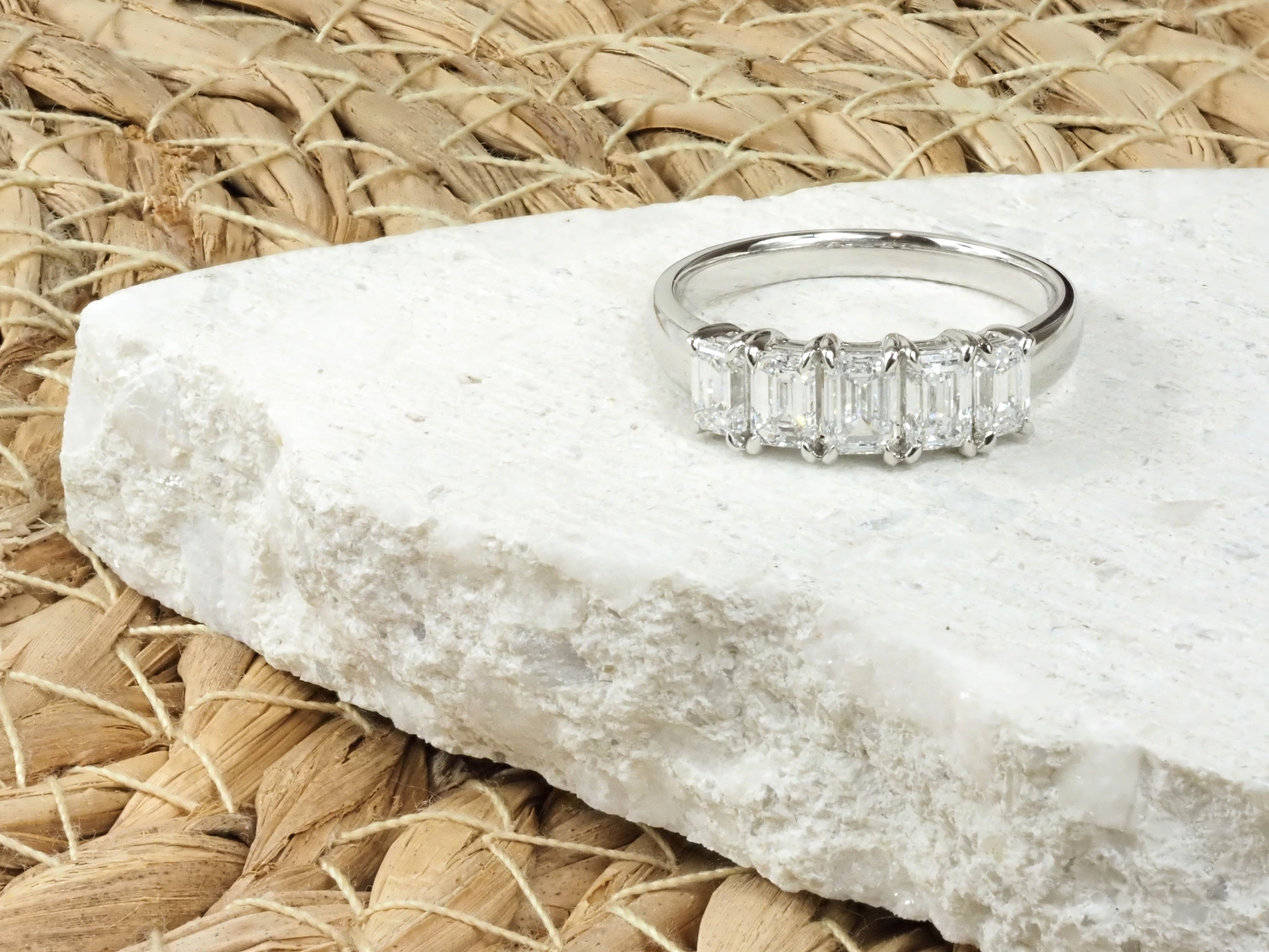 14 Carat White Gold, 5 Emerald-cut Lab-grown Ring, 1.51 carats total.