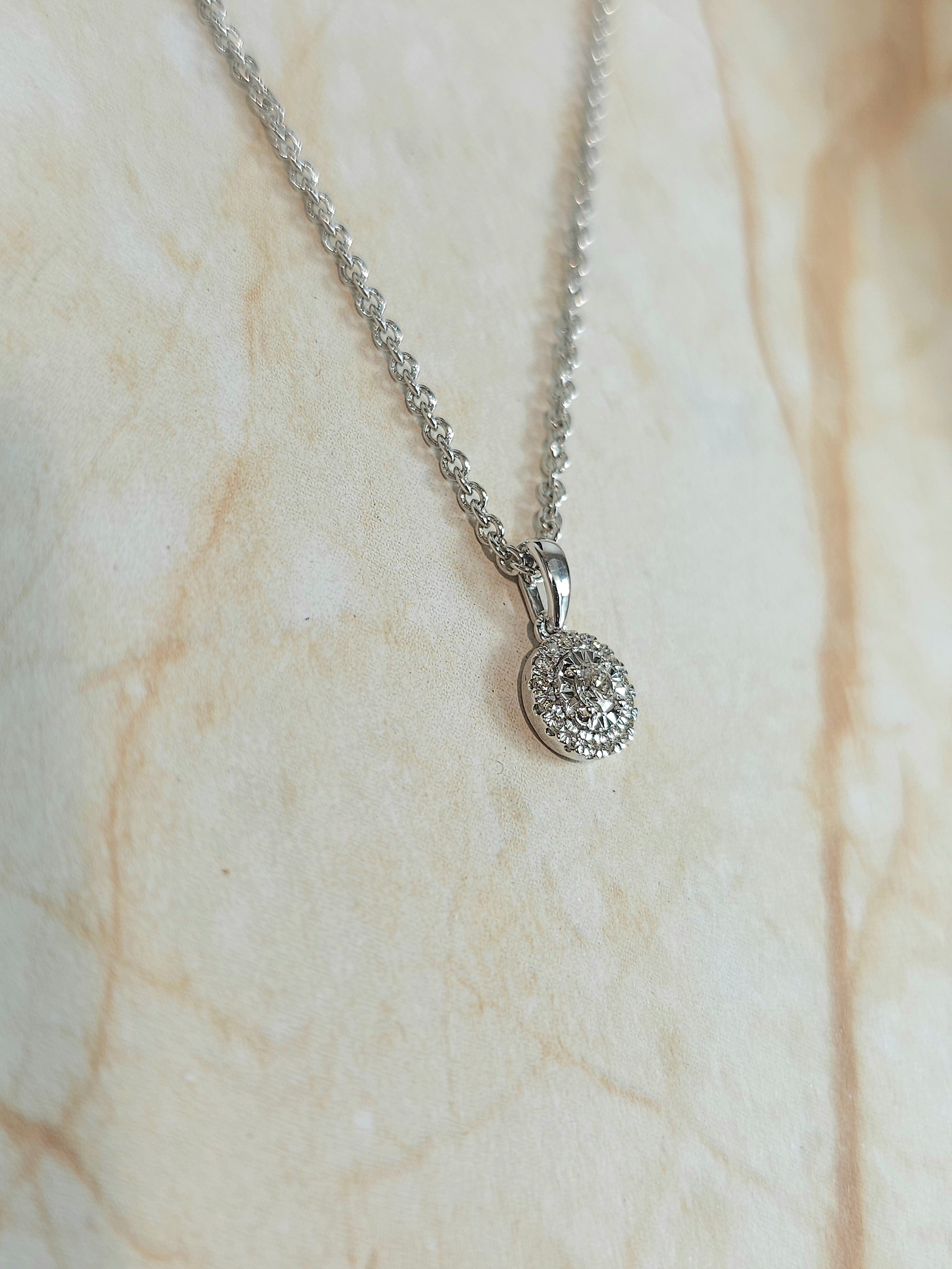 9ct white gold 0.16ct diamond pendant