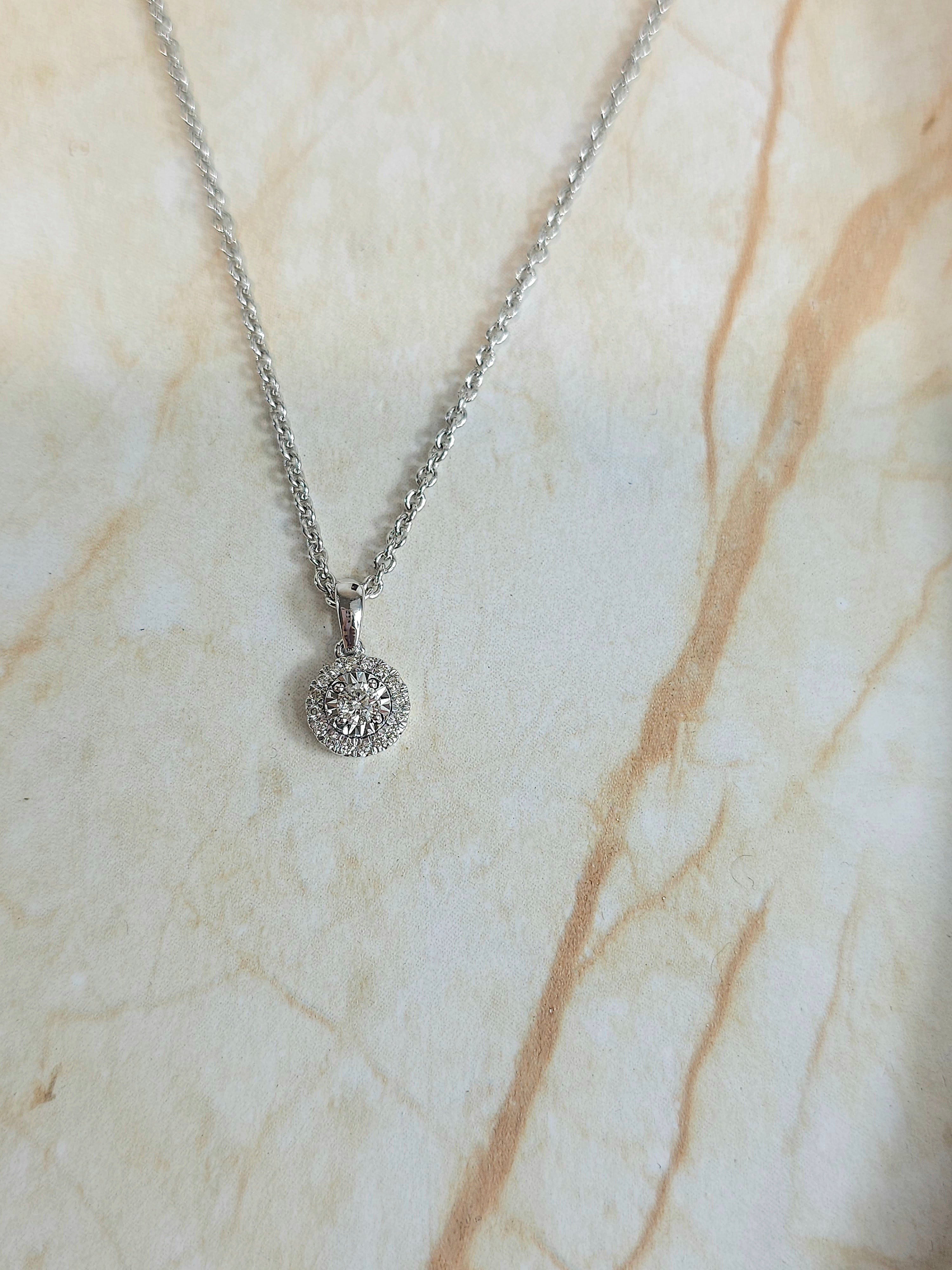 9ct white gold 0.16ct diamond pendant