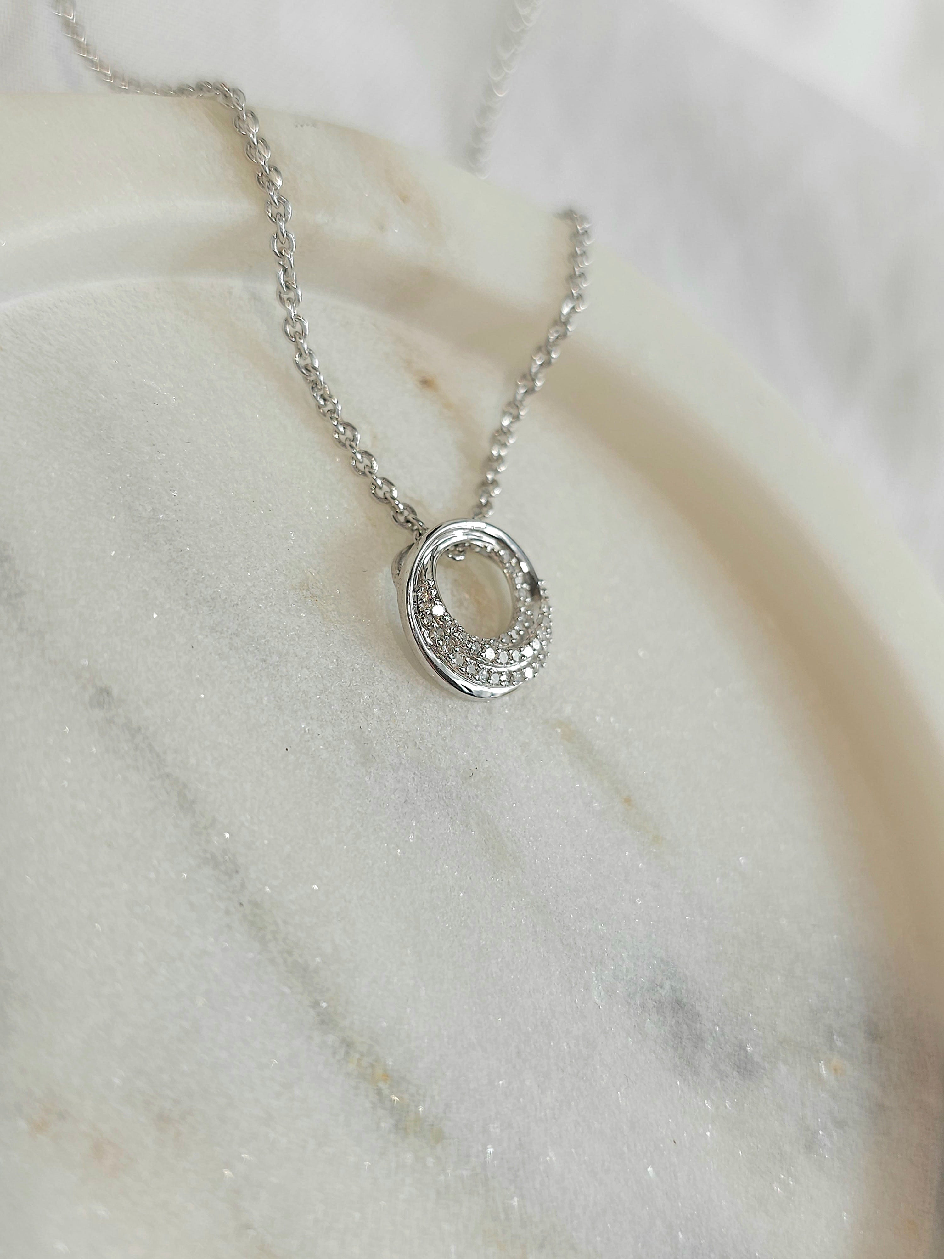 9ct white gold 0.10ct diamond circle slider pendant