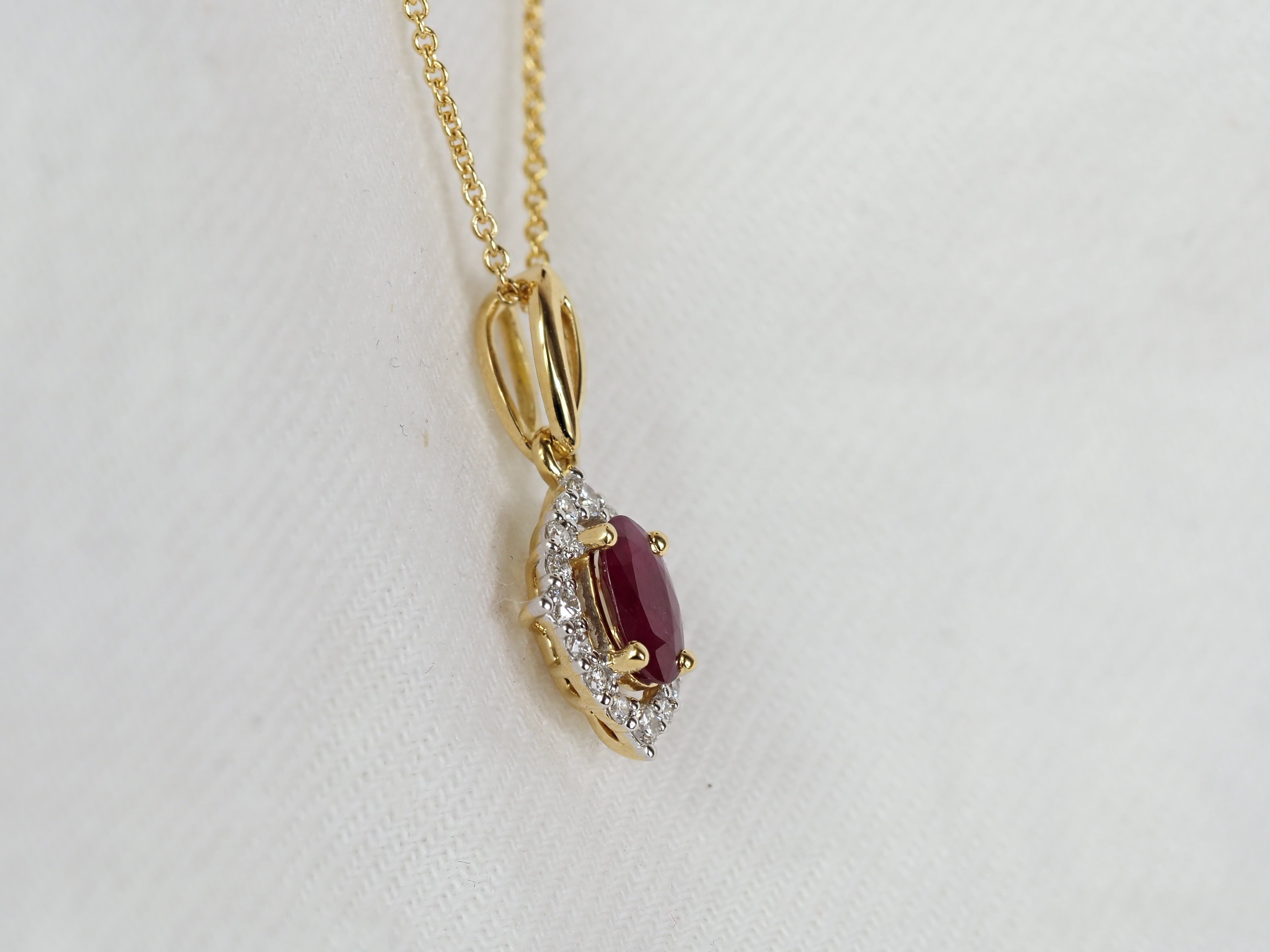 18ct Yellow and White Gold Ruby and Diamond Pendant, 0.45ct Centre