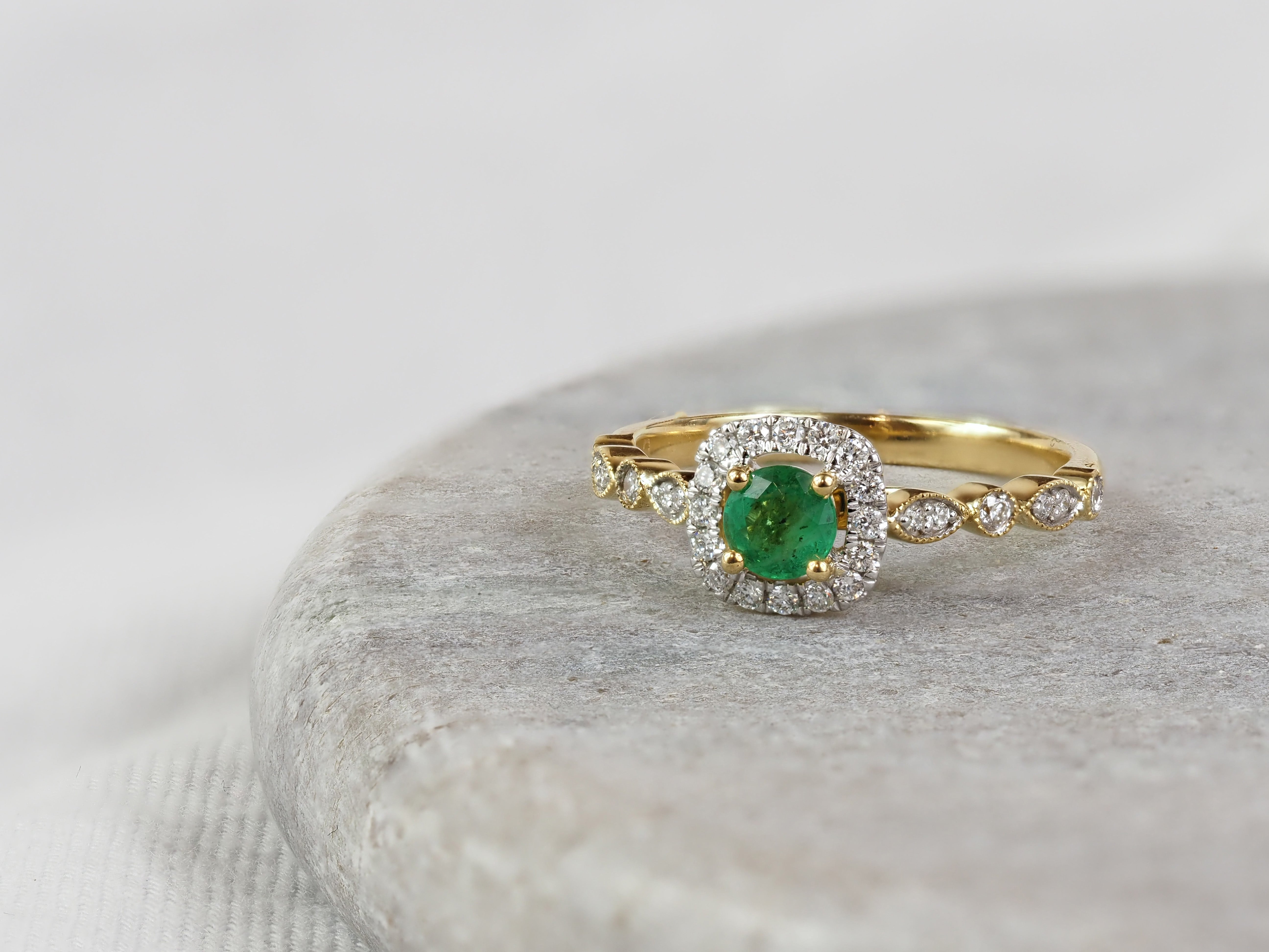 18ct Yellow and White Gold Emerald and Diamond Halo Ring, 0.30ct Centre