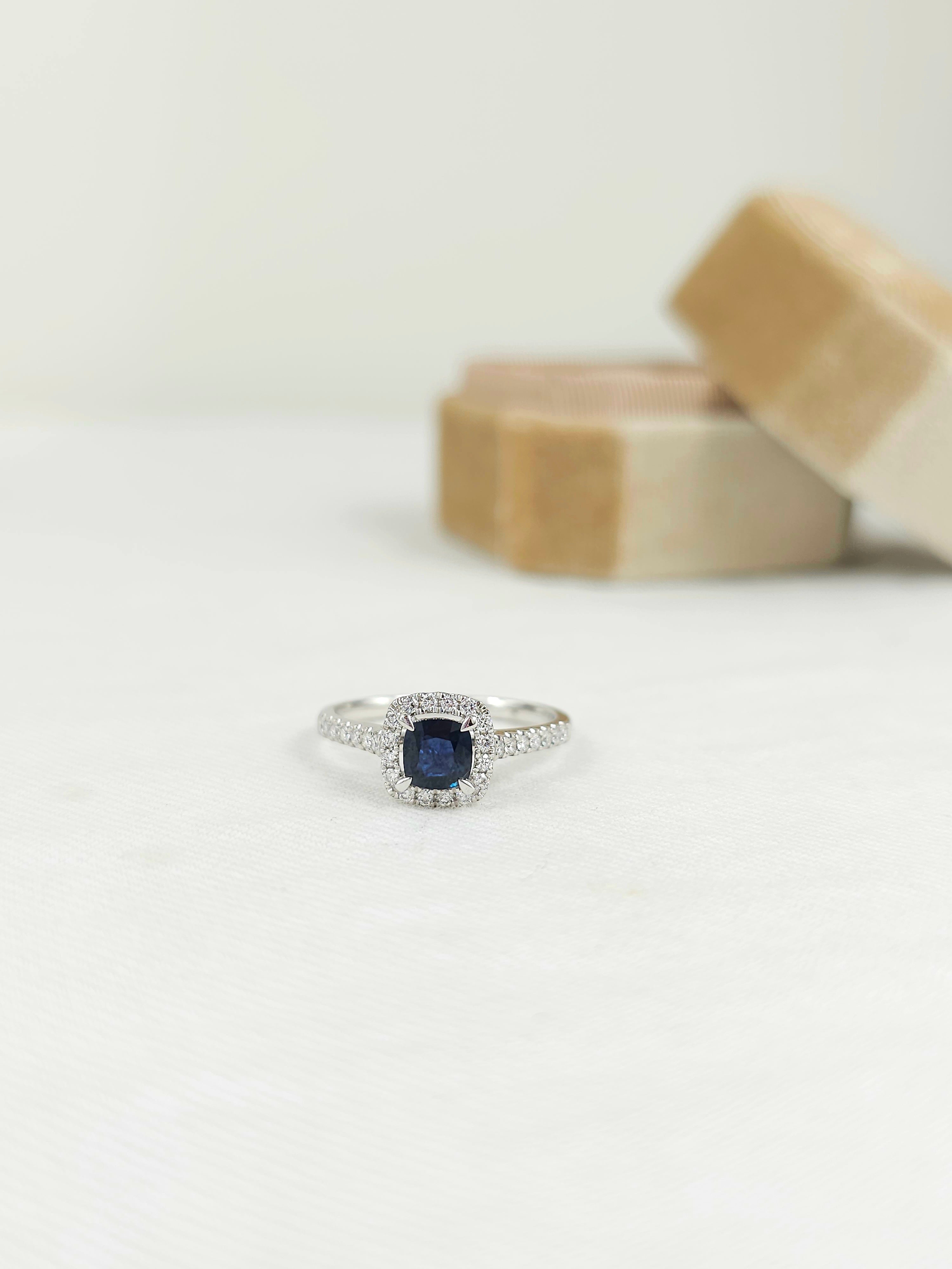 18ct White Gold Sapphire and Diamond ring, 0.56ct centre