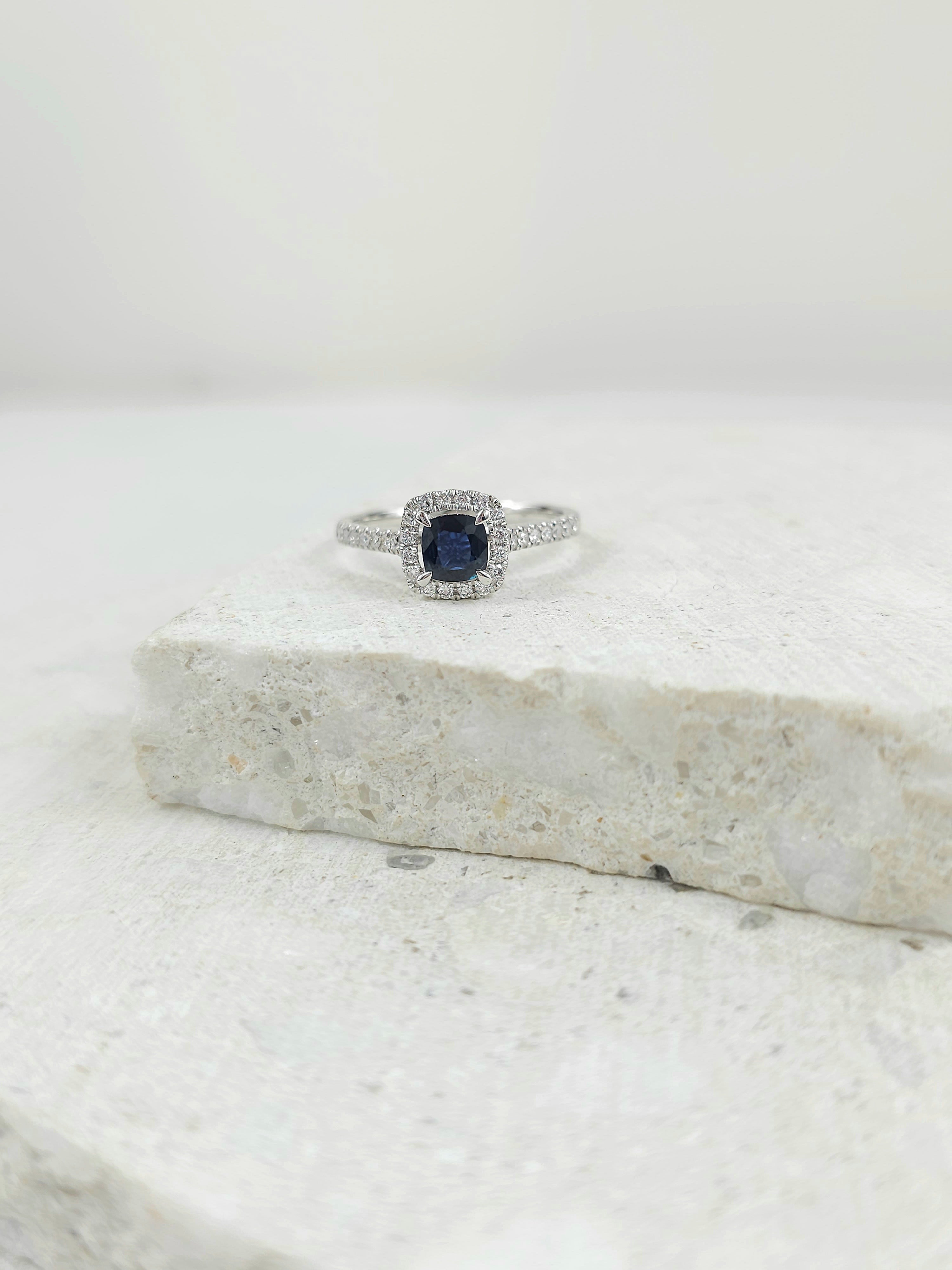 18ct White Gold Sapphire and Diamond ring, 0.56ct centre